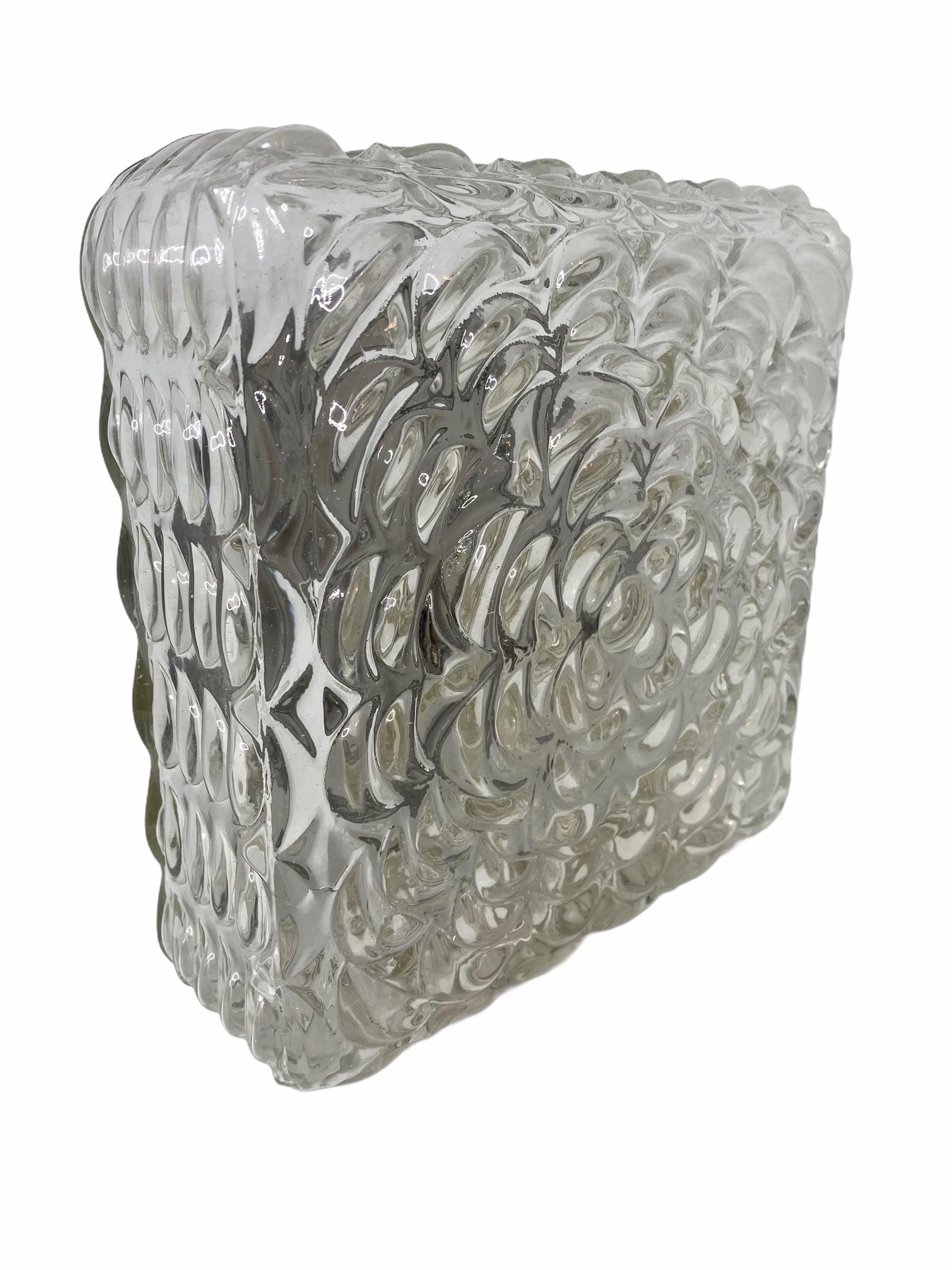 Petite flower pattern flush mount. Gorgeous textured glass flush mount with metal fixture. The Fixture requires one European E14 / 110 Volt candelabra bulb, up to 60 watts.