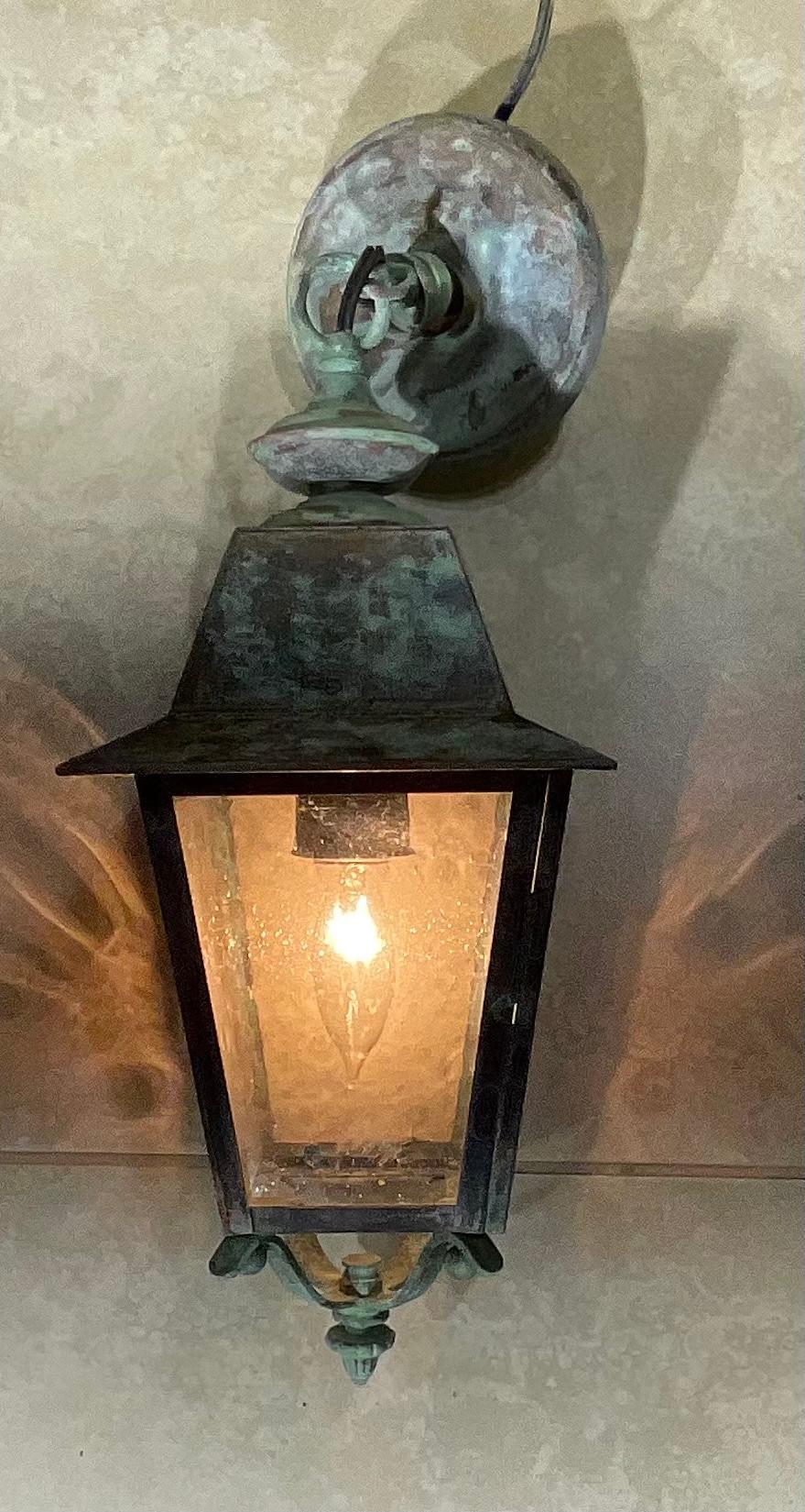 Beautiful patina, four sides hanging lantern made of solid brass, electrified with one 60/watt light, good for wet location, ready to use.
Brass canopy and included.