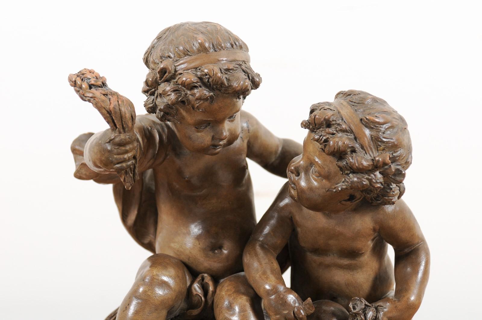 Petite French 1830s Louis-Philippe Terracotta Sculpture of Two Putti on a Base 9