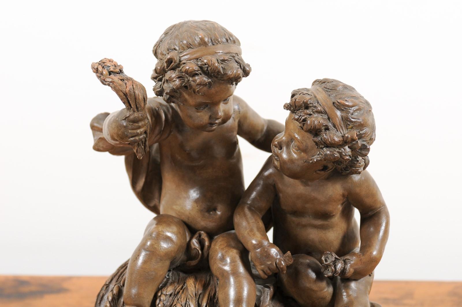 Petite French 1830s Louis-Philippe Terracotta Sculpture of Two Putti on a Base In Good Condition In Atlanta, GA