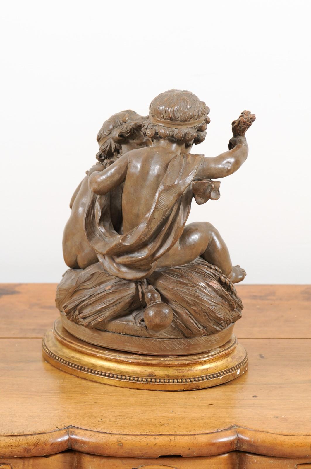 Petite French 1830s Louis-Philippe Terracotta Sculpture of Two Putti on a Base 3