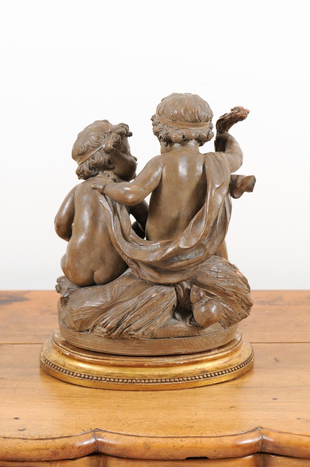 Petite French 1830s Louis-Philippe Terracotta Sculpture of Two Putti on a Base 4