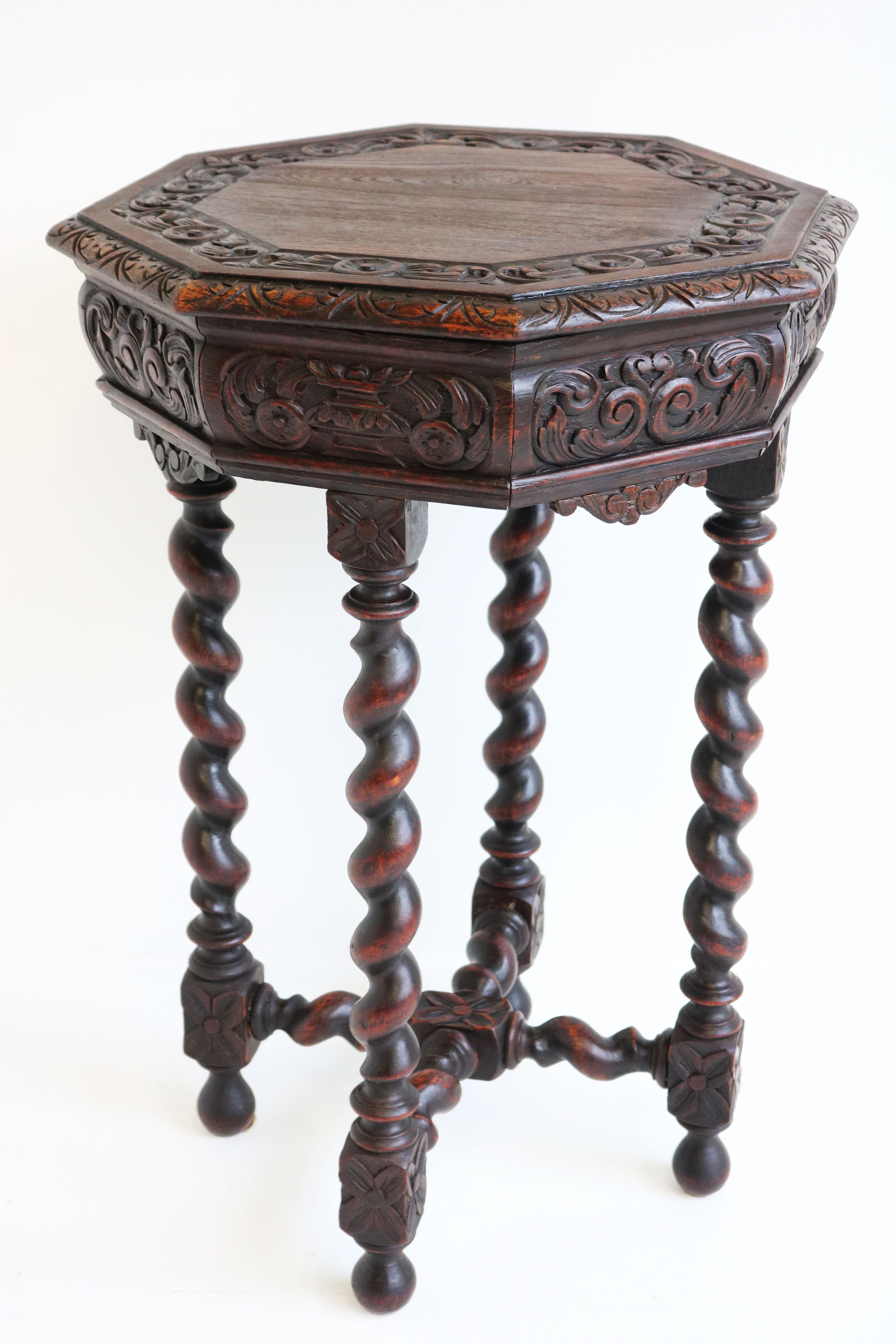 Lovely petite octagonal 19th century French antique side / end table renaissance revival style. 
Richly decorated with many hand carved symmetrical renaissance style decorations. And fitted on barley twisted columns.
The entire piece is made out