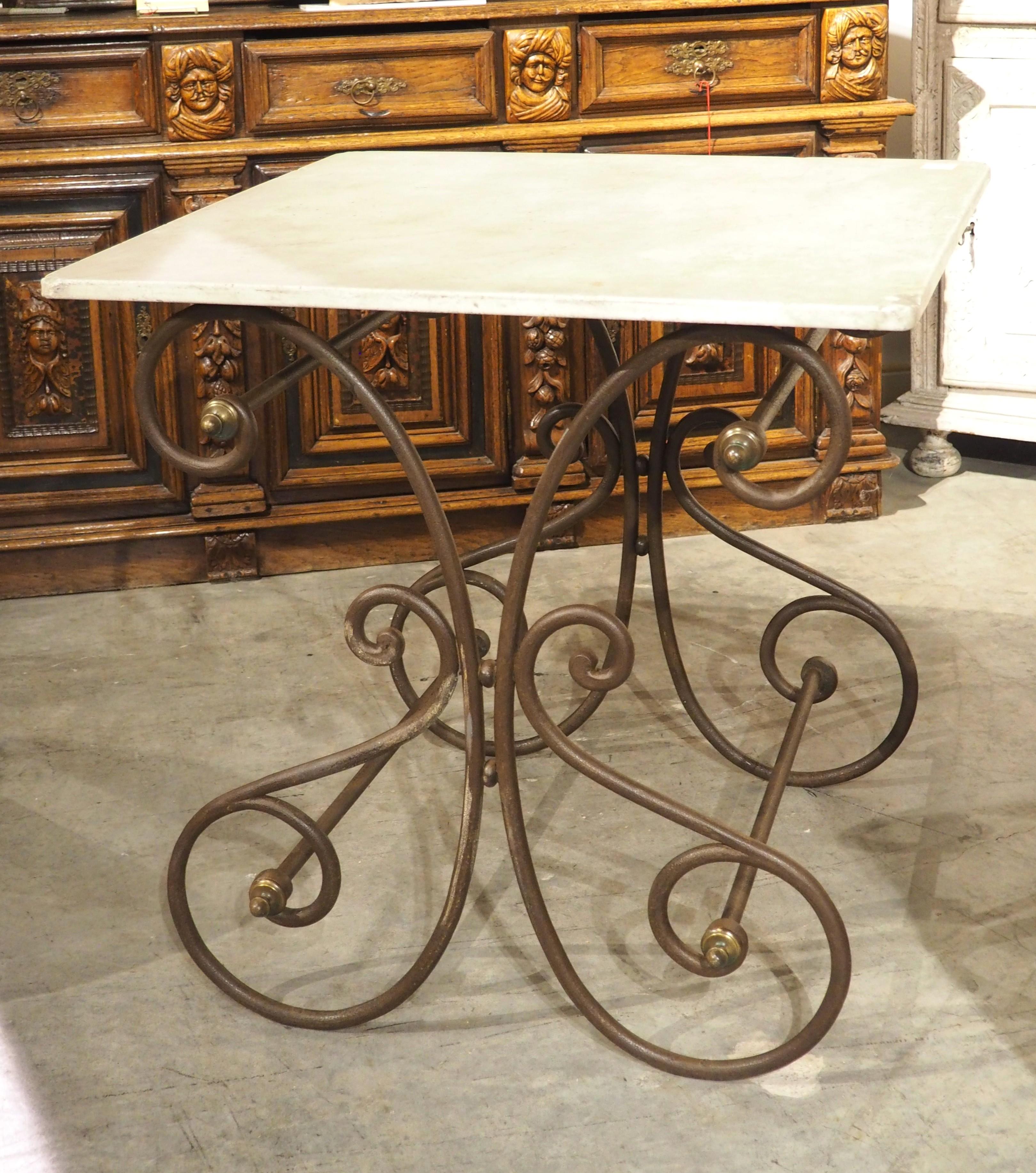More information coming soon…

A table such as this petite iron and marble one would have been seen in a French boucherie or pastry store in the late 1800s.  Based on the smaller size, the table was most likely for display within the store.  The