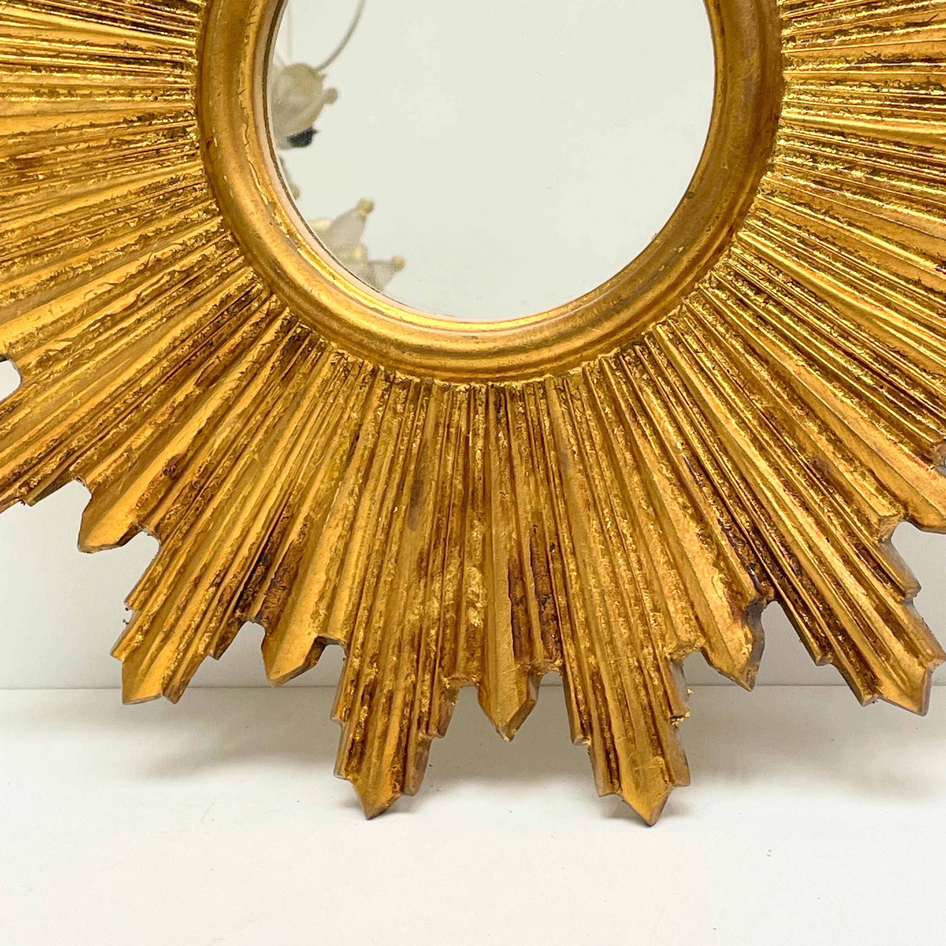 Hollywood Regency Petite French Starburst Sunburst Gilded Wood Mirror, circa 1950s Toleware