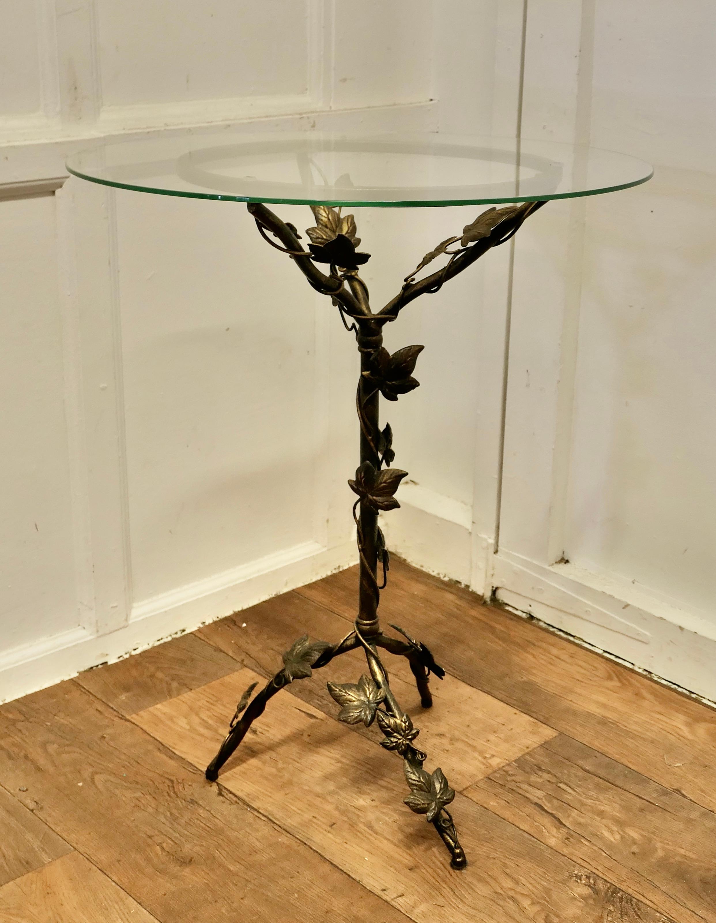 Petite French Toleware and Glass Wine Table

This lovely table stands on a three footed metal base which has an attractive twisted vine decoration on a centre leg
The thick round glass top gives a good view of the guilt toleware decoration 
The