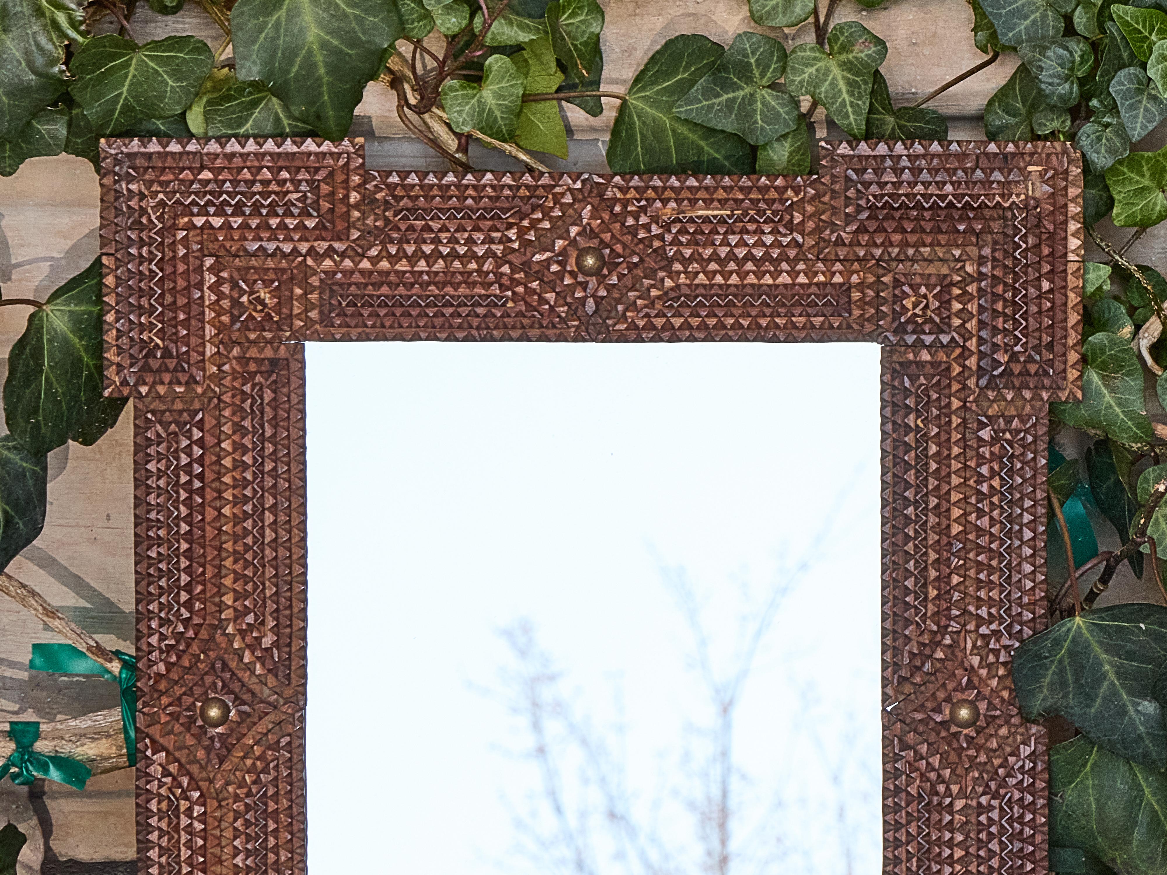 Hand-Carved Petite French Tramp Art Mirror with Carved Geometric Frame, circa 1900 For Sale
