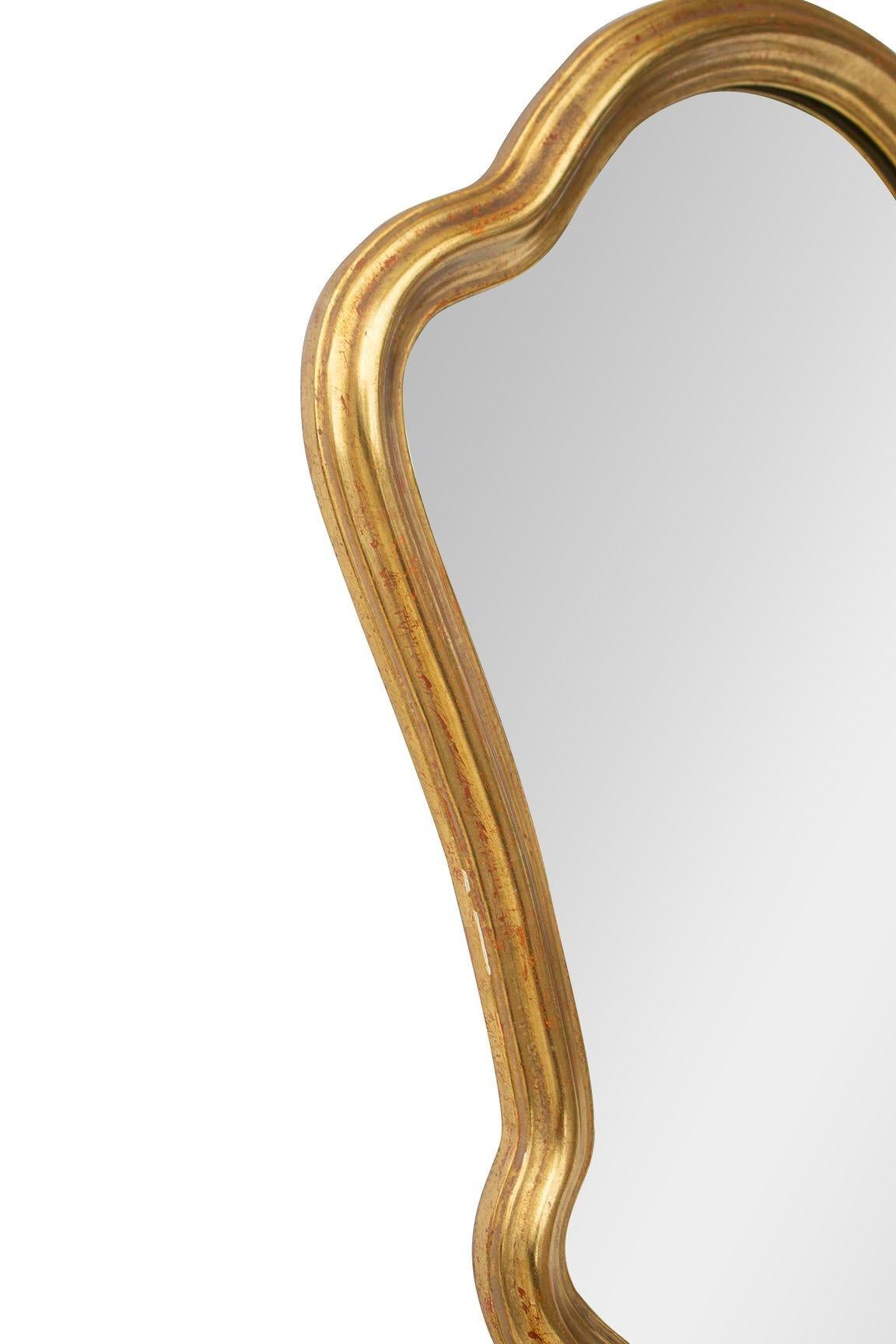 USA, 1970s
Vintage petite gilt mirror by LaBarge. This is a more unusual smaller size. Great on its own or with company. Tag on reverse says it is pattern 1392, La Barge, Holland, Michigan.
DIMENSIONS: 16 7/8