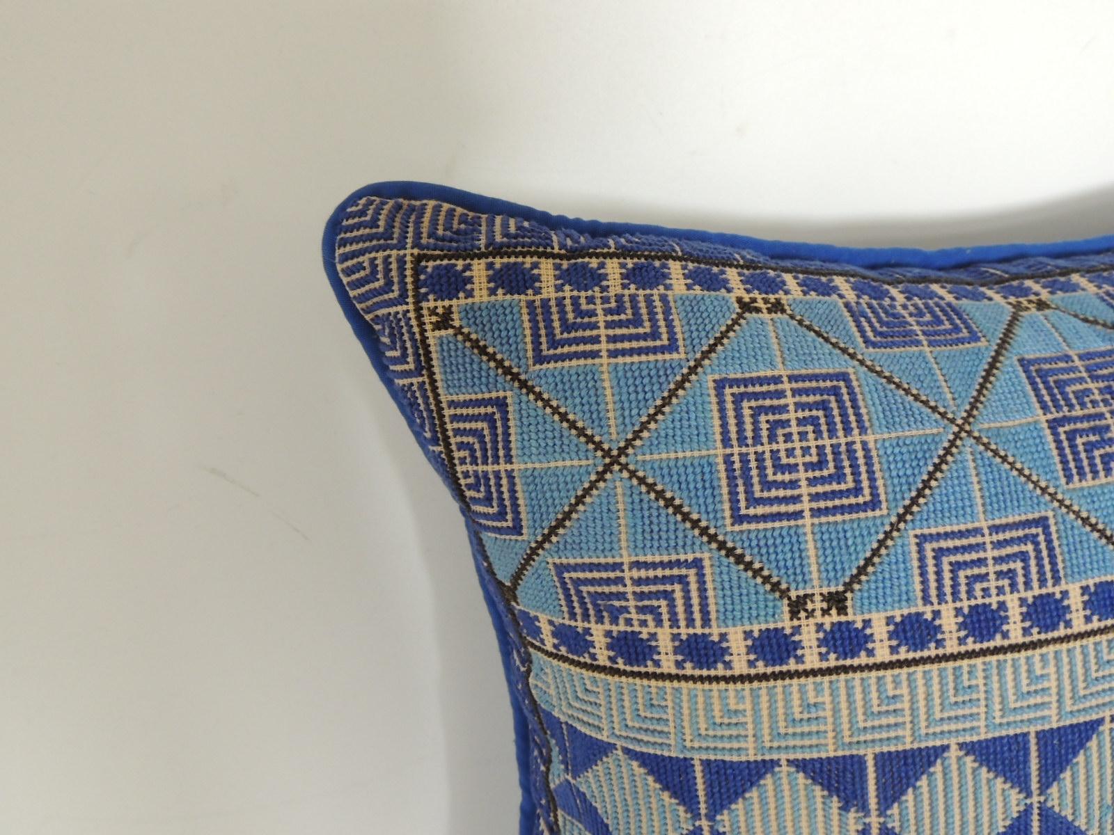 Petite Greek isle style blue and natural embroidered decorative pillow.
Blue cotton backing and self-welt, zipper closure, feather/down insert.
Size: 15
