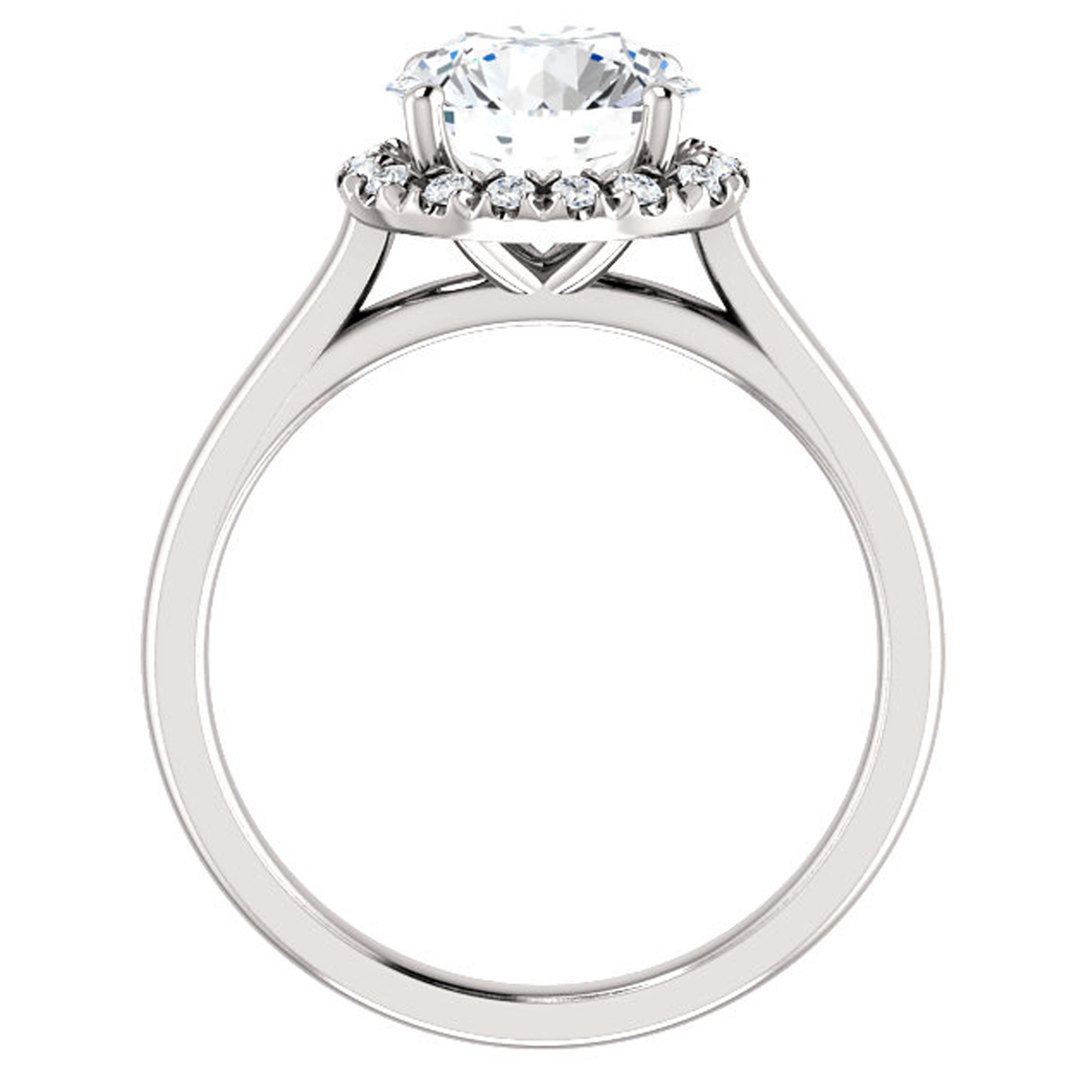 Lustrous white diamonds encircle the halo of this Valorenna plain shank style engagement ring. Simple yet unique, this engagement is the perfect way to propose to a classic minded lady.

Matching band sold separately.

Center Stone:
1 Round-cut