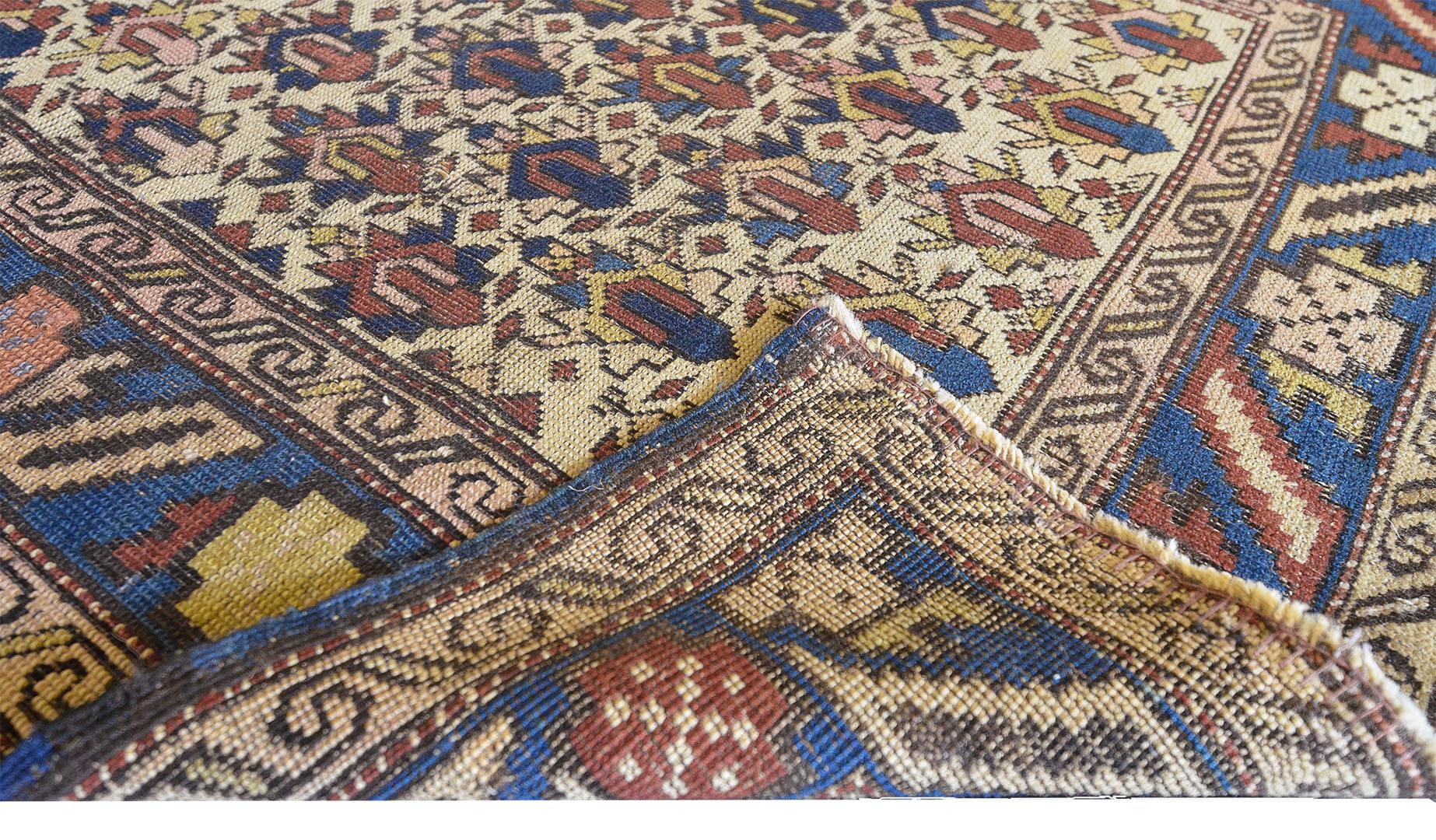 Hand-Woven Petite Handwoven Antique Wool Caucasian Rug For Sale