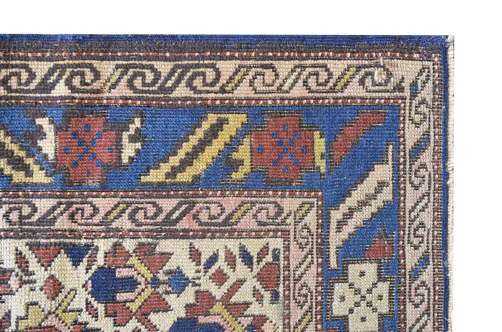 Petite Handwoven Antique Wool Caucasian Rug In Good Condition For Sale In West Hollywood, CA
