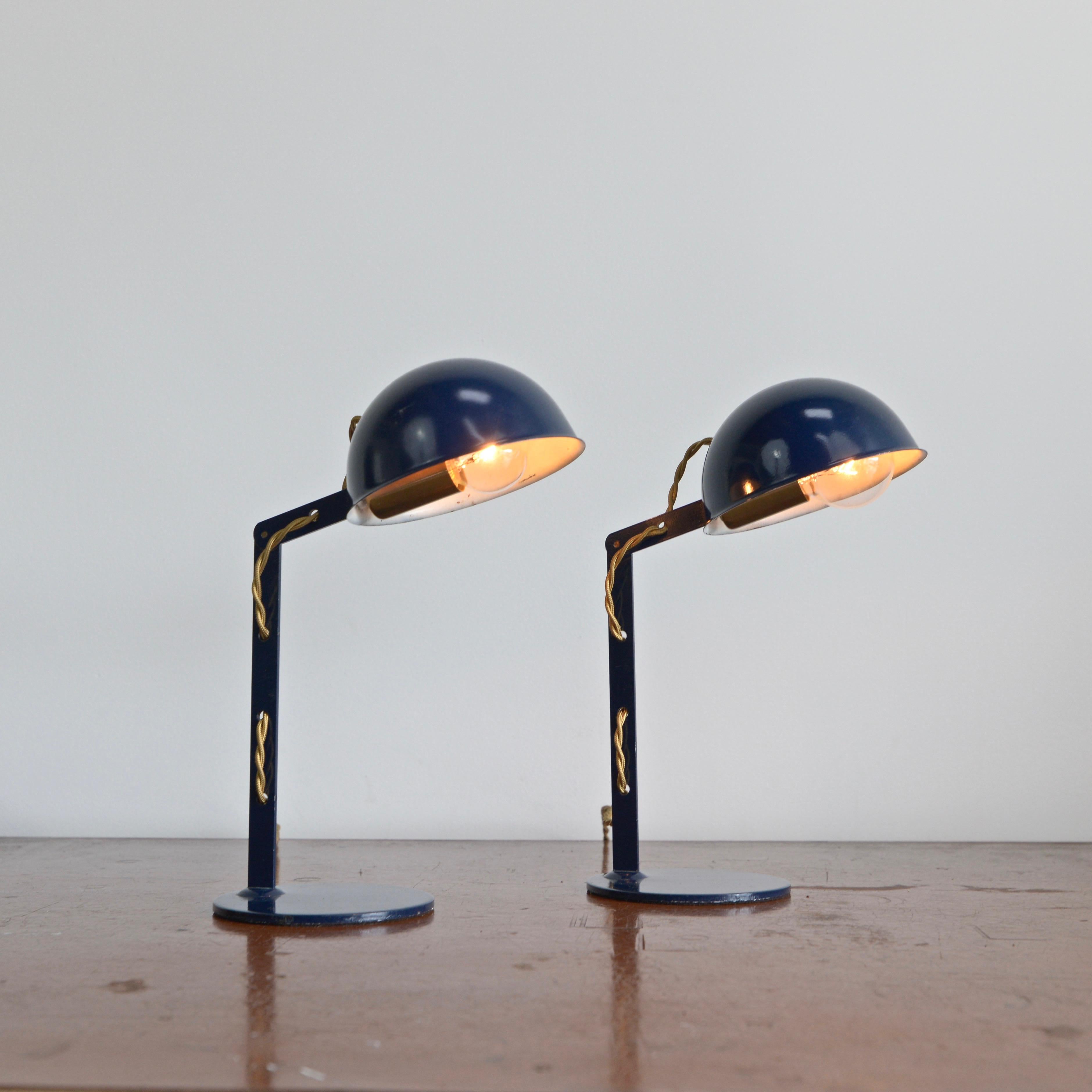 A pair of vintage Italian petite industrial table lamps from the 1950s. In steel and brass. Fully rewired with a single E12 candelabra based socket per table lamp, ready to be used in the USA. Sold as a pair.
Measurements:
Height 11”
Shade