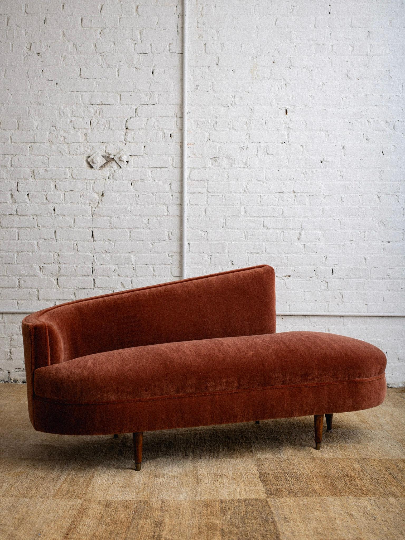 A petite Italian chaise lounge. Newly reupholstered in a high pile rust mohair. Ideal Size to be used at the foot of a bed or as a hall bench. Sourced in Northern Italy.