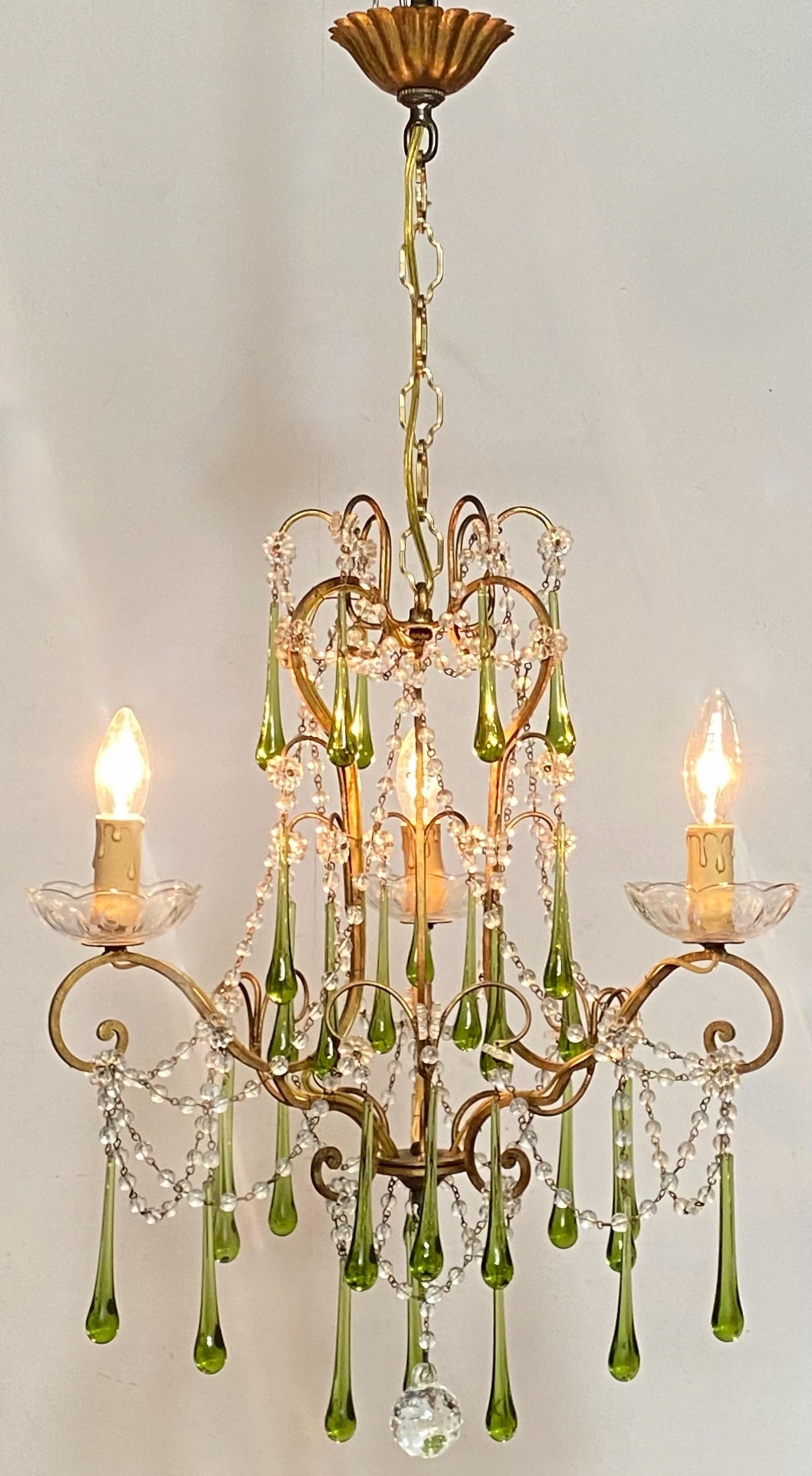 A small size vintage crystal and glass pendant chandelier. Having light green and clear glass hanging drops, and draped glass beaded swags.
Recently cleaned, and re-wired. Ready to install.
Perfect for a small room, washroom or hallway.
Italy,