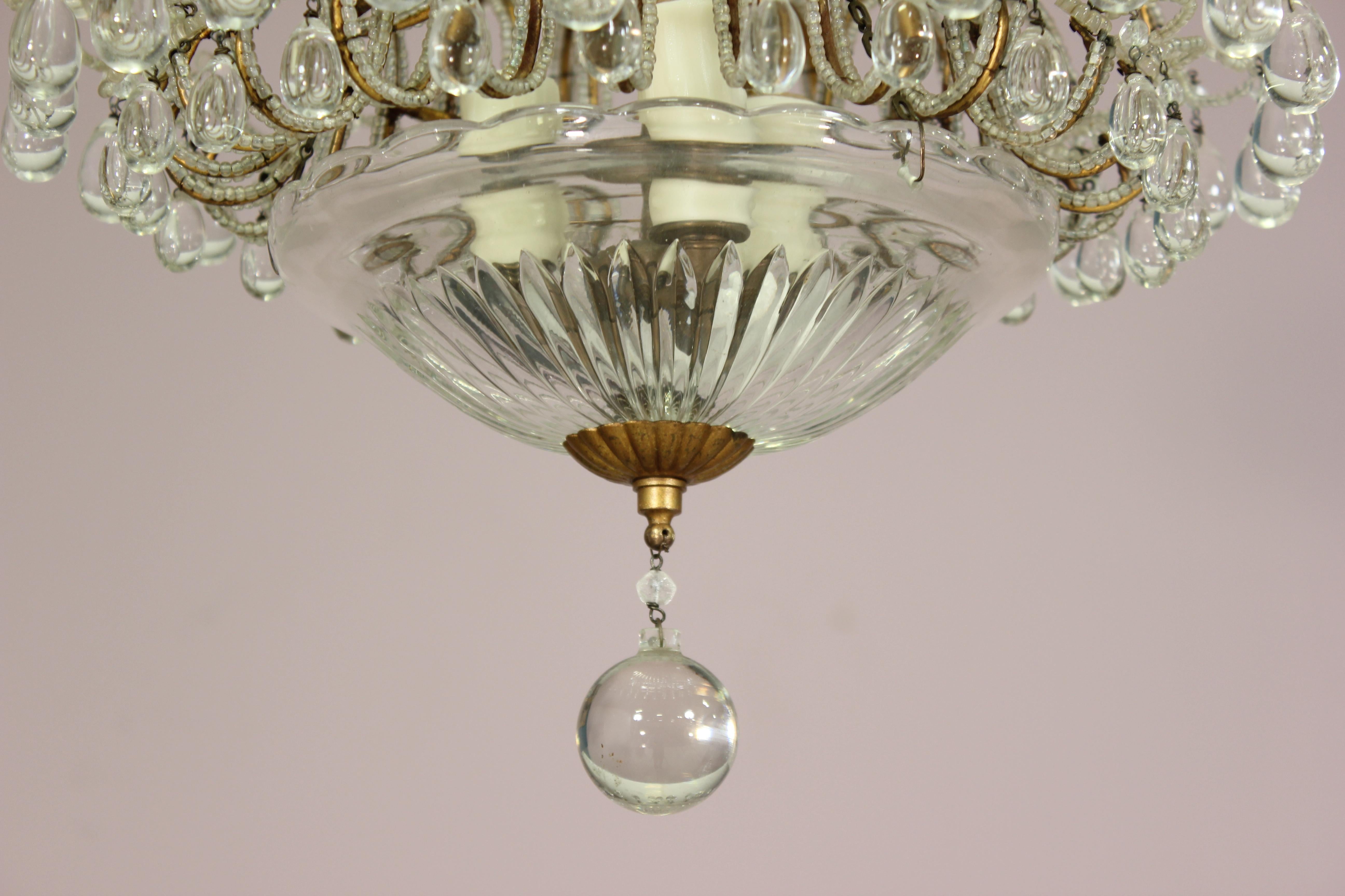 1940s Italian petite-scale crystal beaded chandelier with an etched glass dome shade which diffuses the light from the three candelabra bulbs at center. 

Perfect for a space in need of a little charm and radiance.

Wired and in working condition.