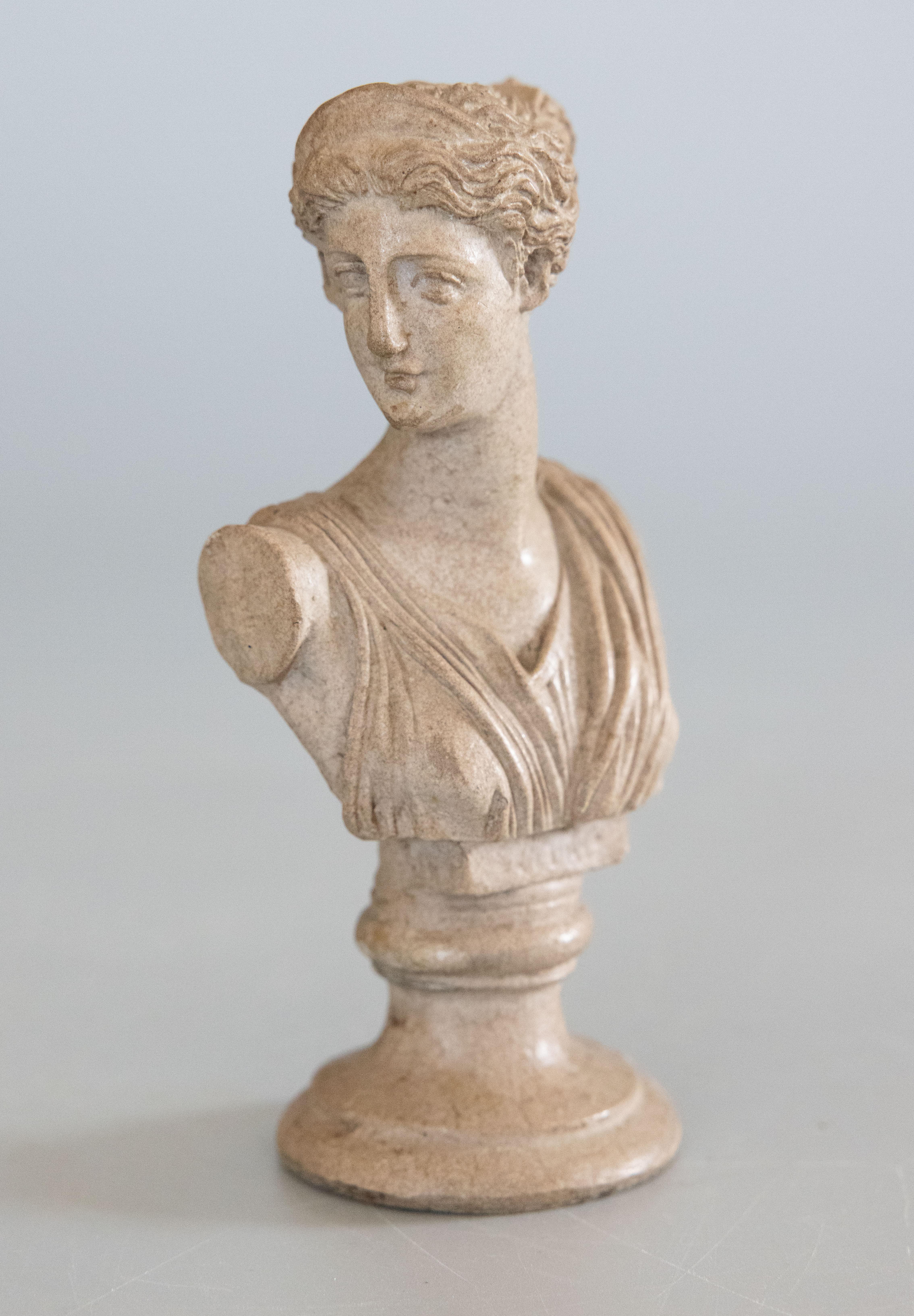 A fine antique petite Italian Grand Tour souvenir stone bust of Greek Goddess Diana of Versailles, circa 1880. Sourced in Paris, France. She displays beautifully, perfect on a desk or bookshelf in a library or study.

In the 18th and 19th centuries,