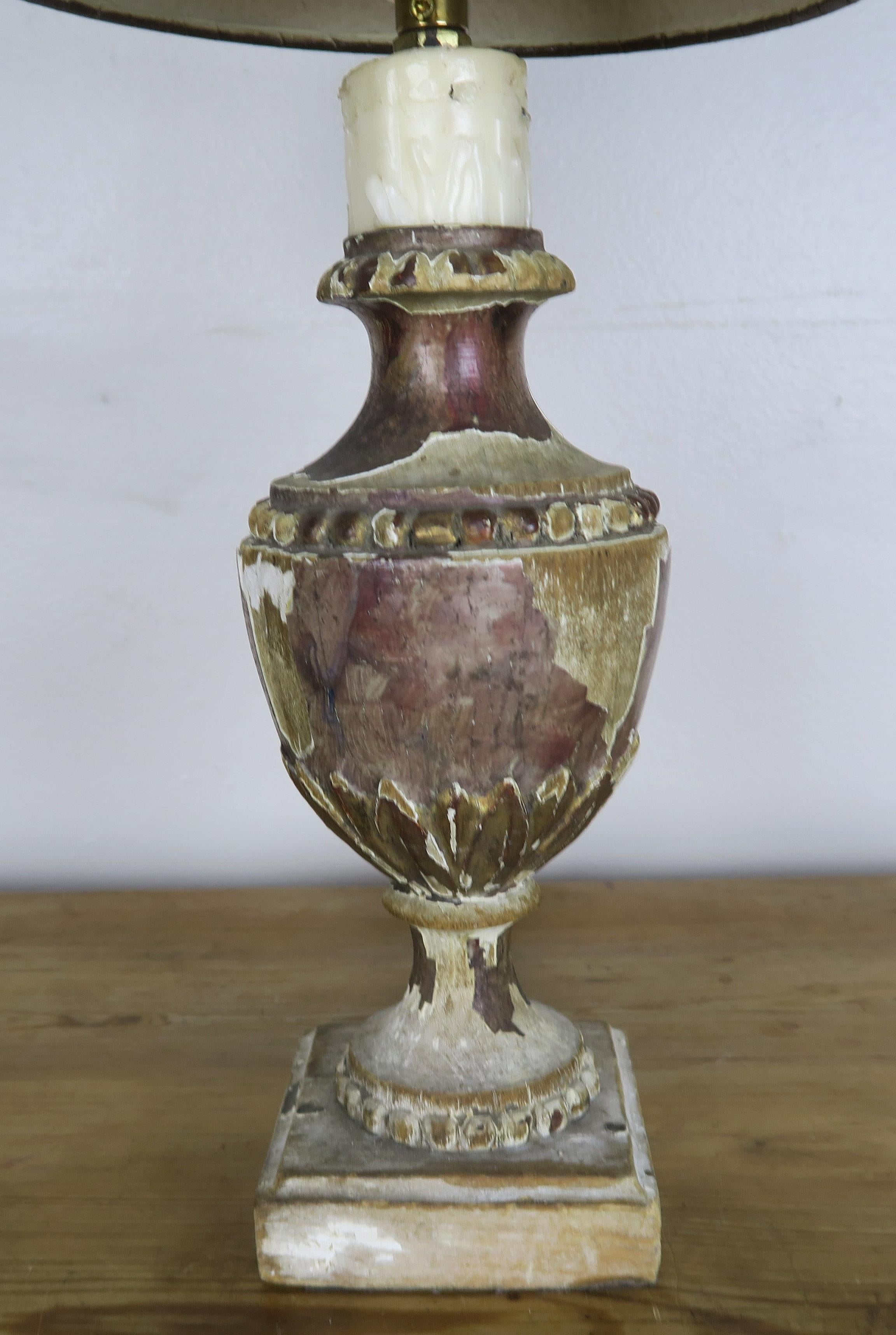 Petite Italian urn wired into a lamp and crowned with a hand painted parchment shade. The lamp is wired and in working condition.
