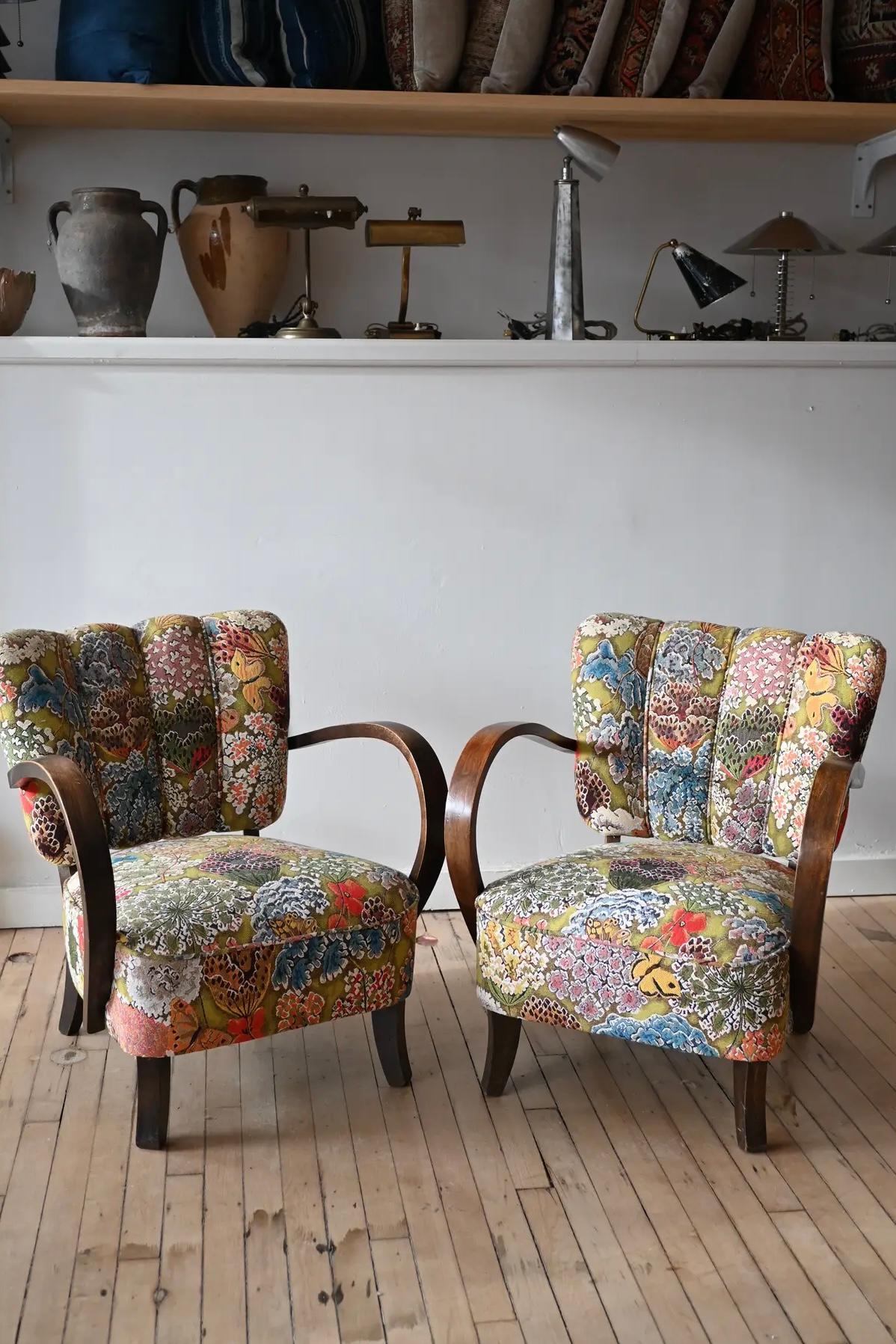 A sophisticated pair of Jendrich Halabala Armchairs. Petite with classic bentwood arms and a channeled back, all freshly covered with the luscious Le Soleil Pour Temoin by Pierre Frey. 

