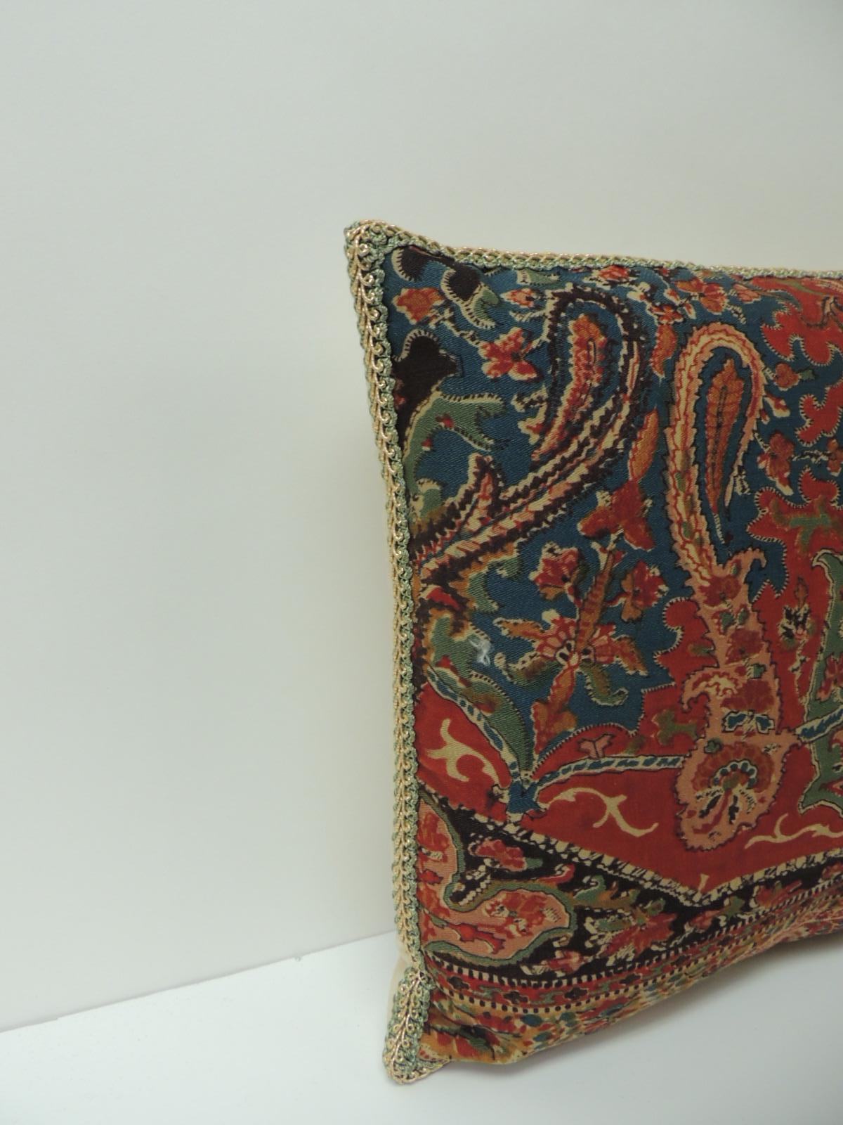 Petite Kashmir paisley silk red textile pillows from India. Sericulture and tweed weaving are one of the major industries in Kashmir. Interestingly, just as little or no raw-material for tweed comes from Kashmir, the same way almost no weaving and