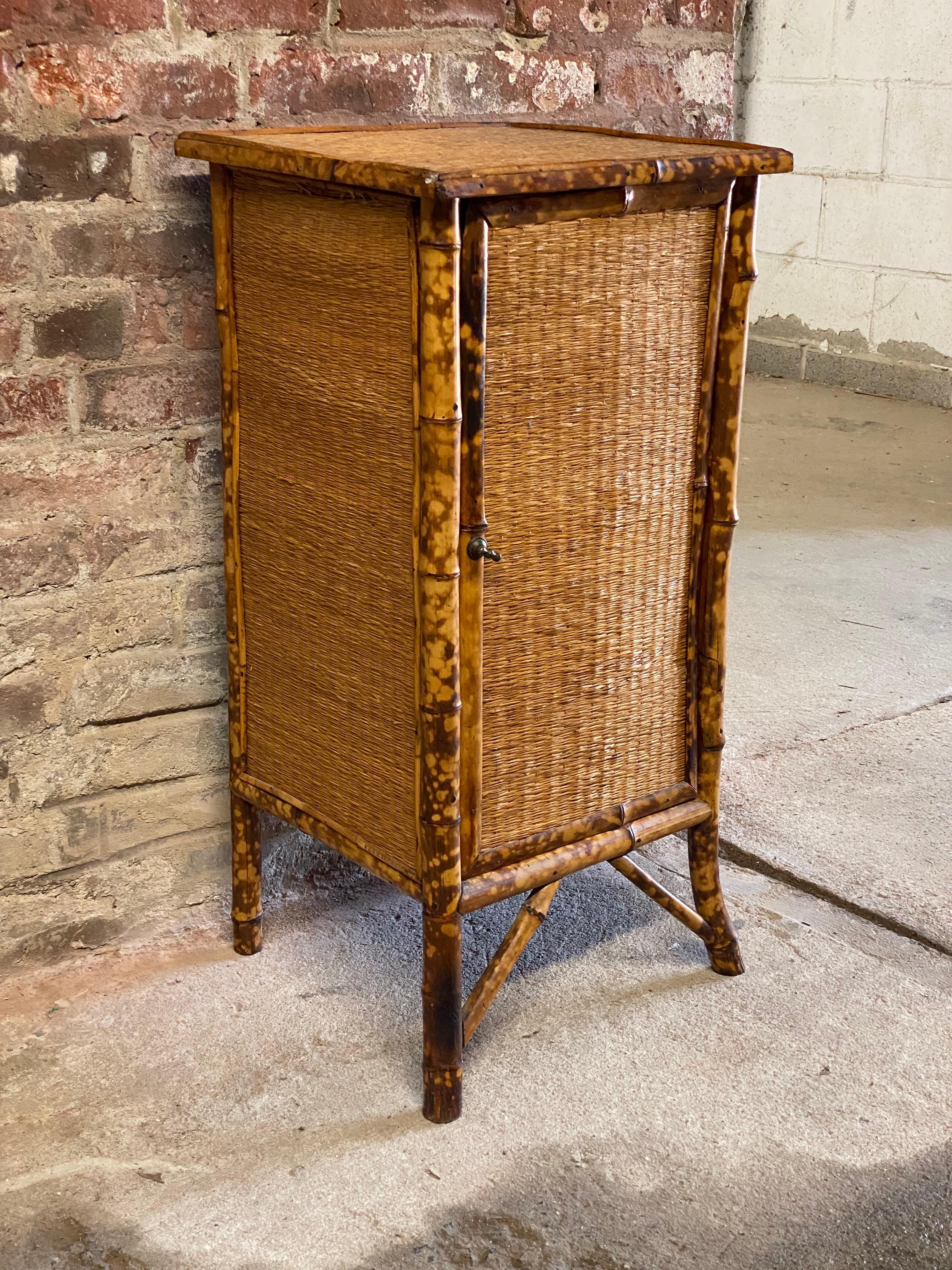 Petite Late Victorian Bamboo and Grasscloth Cabinet In Good Condition In Garnerville, NY