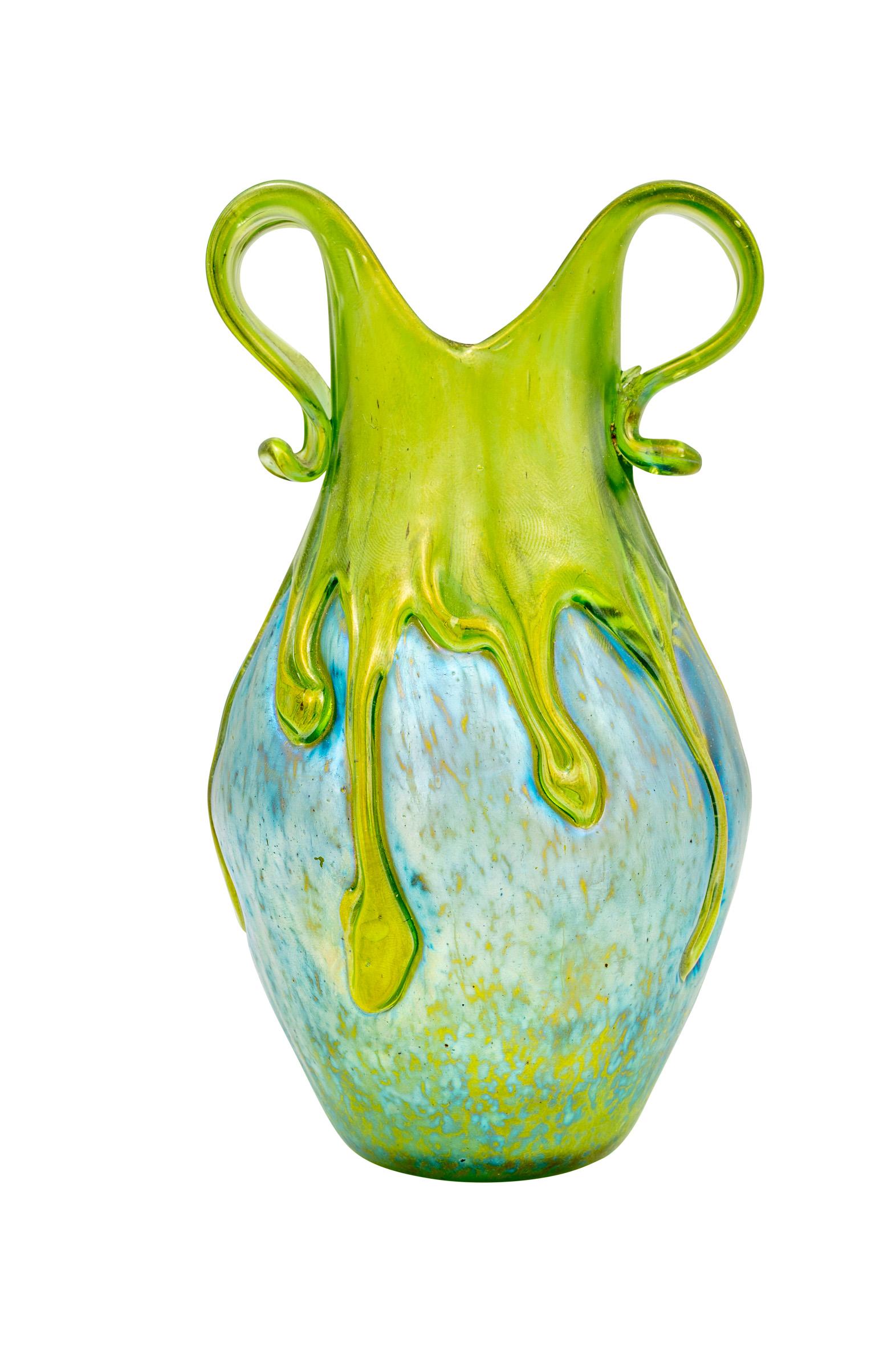 Vase manufactured by Johann Loetz Witwe Creta mit Behaengen decoration ca. 1900 Austrian Jugendstil 

The manufactory Johann Loetz Witwe knew how to transform their glass objects into unique art treasures like no other. This gem of art glass