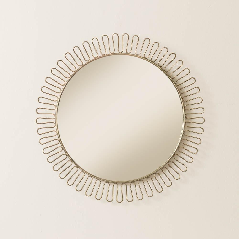 Beautiful vintage 1950's brass loop mirror in the style of Josef Frank in Sweden. Circular brass frame with this brass looping encompassing mirror. Original finish and mirror show nice age and patina.  

