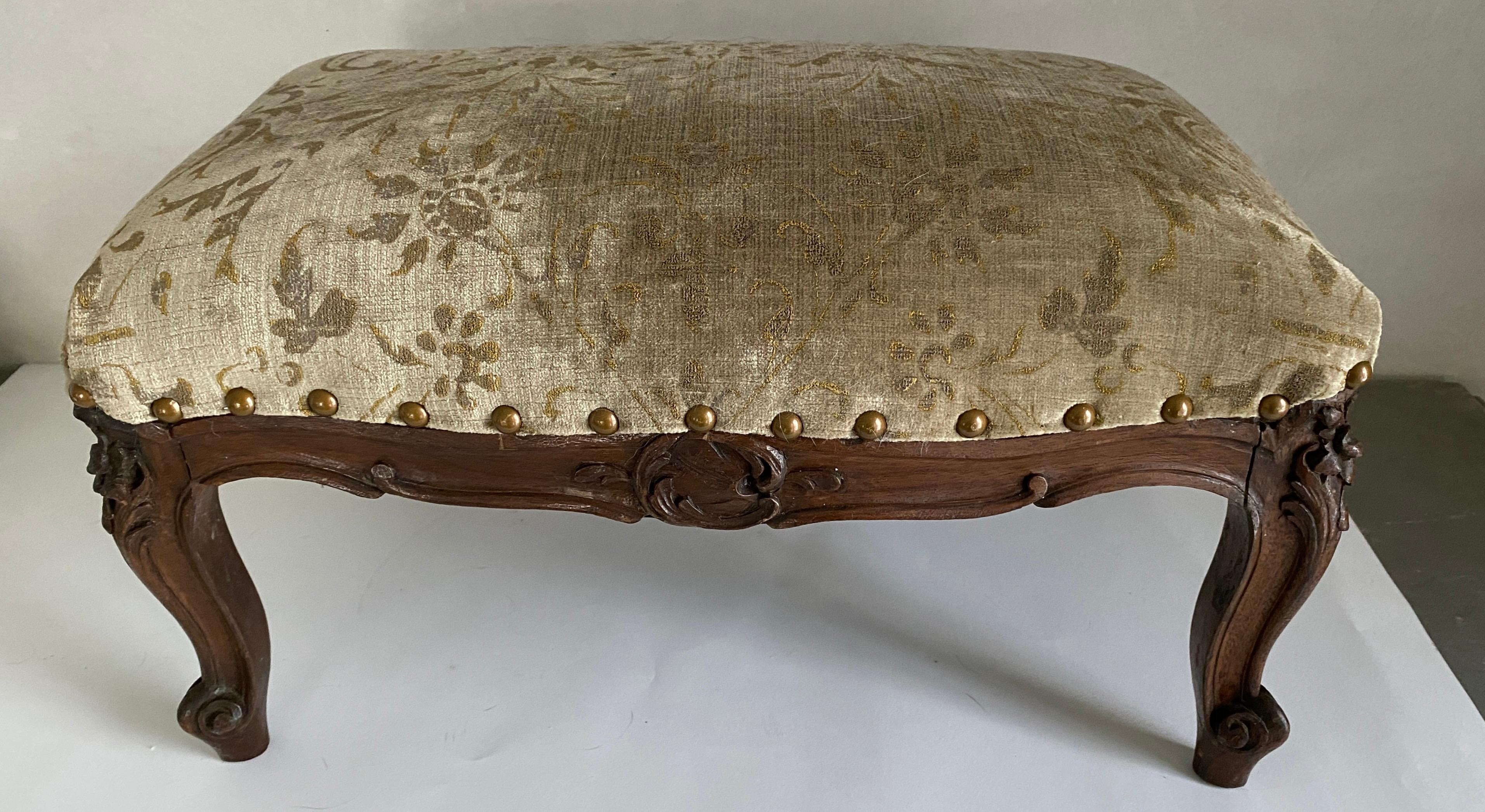 An unusual size, petite and low, this small Louis XV footstool or tabouret, only 10