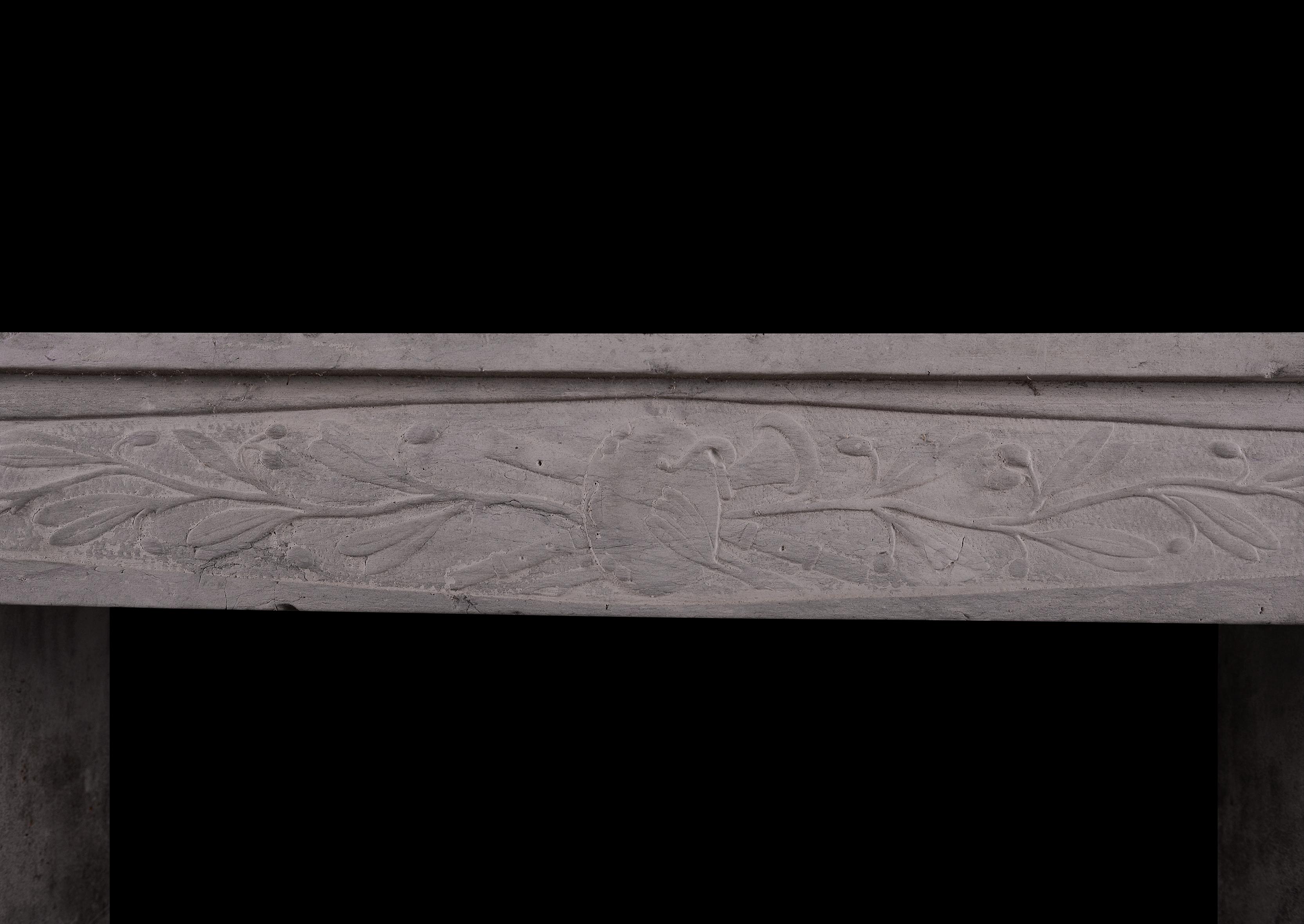 A rustic yet charming French Louis XVI stone fireplace. The delicately carved frieze and jambs with foliage throughout. Directoire period, early 19th century small scale, well suited for a bedroom or study.


Measures: 
Shelf Width:	1055 mm      	41