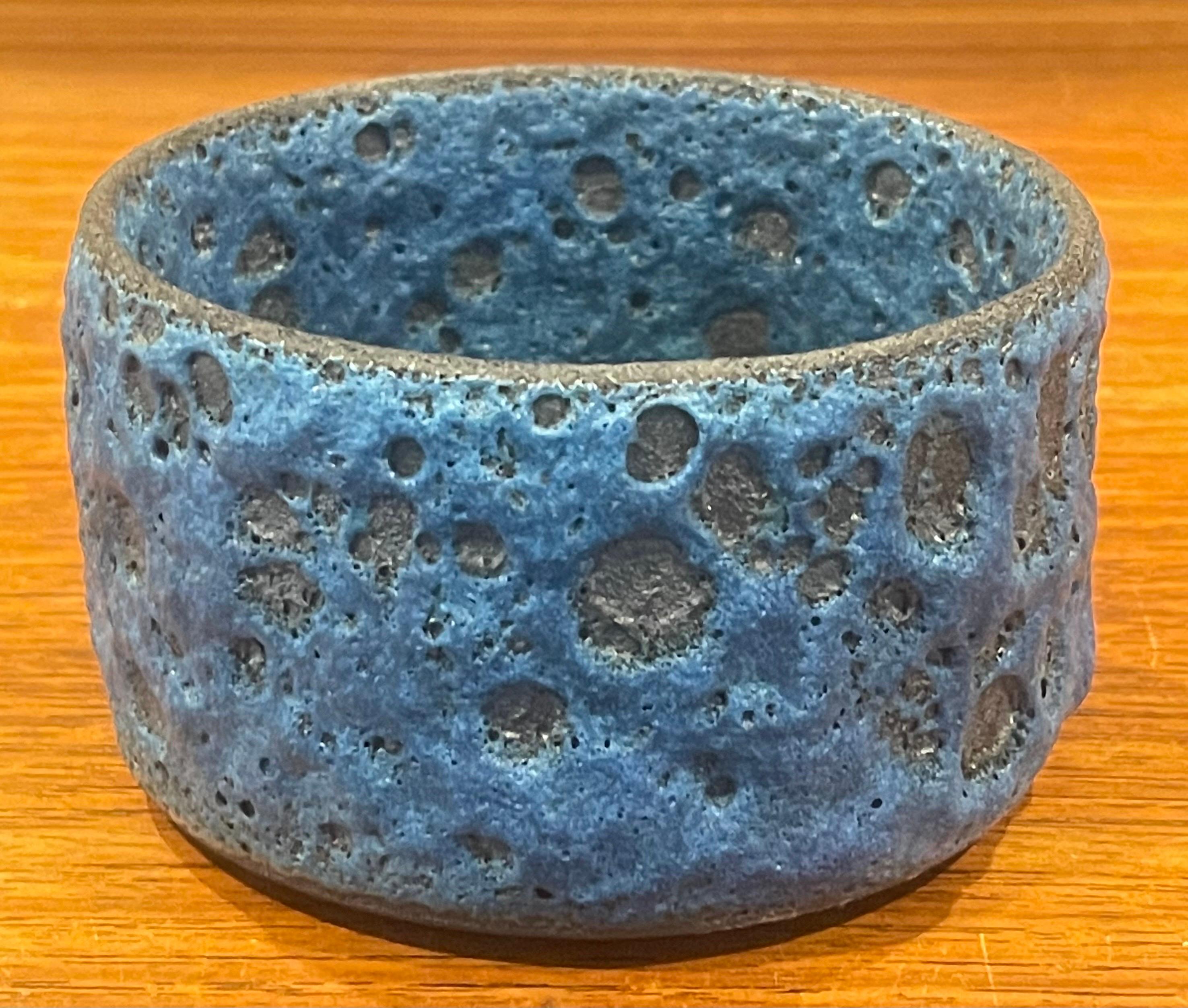 Petite mid-century blue lava glazed bowl, circa 1970s. The piece is in very good vintage condition with no chips or cracks and measures 4.5