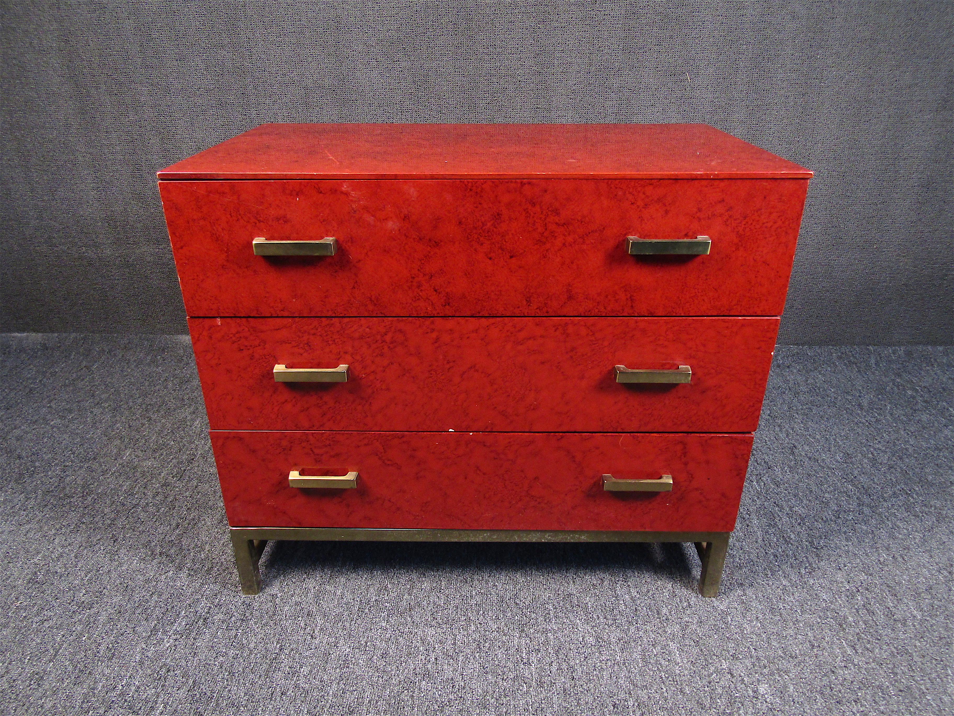 Unusual midcentury piece manufactured by Lane Furniture Co. Deep red finish with brass accents. Please confirm item location with dealer (NJ or NY).