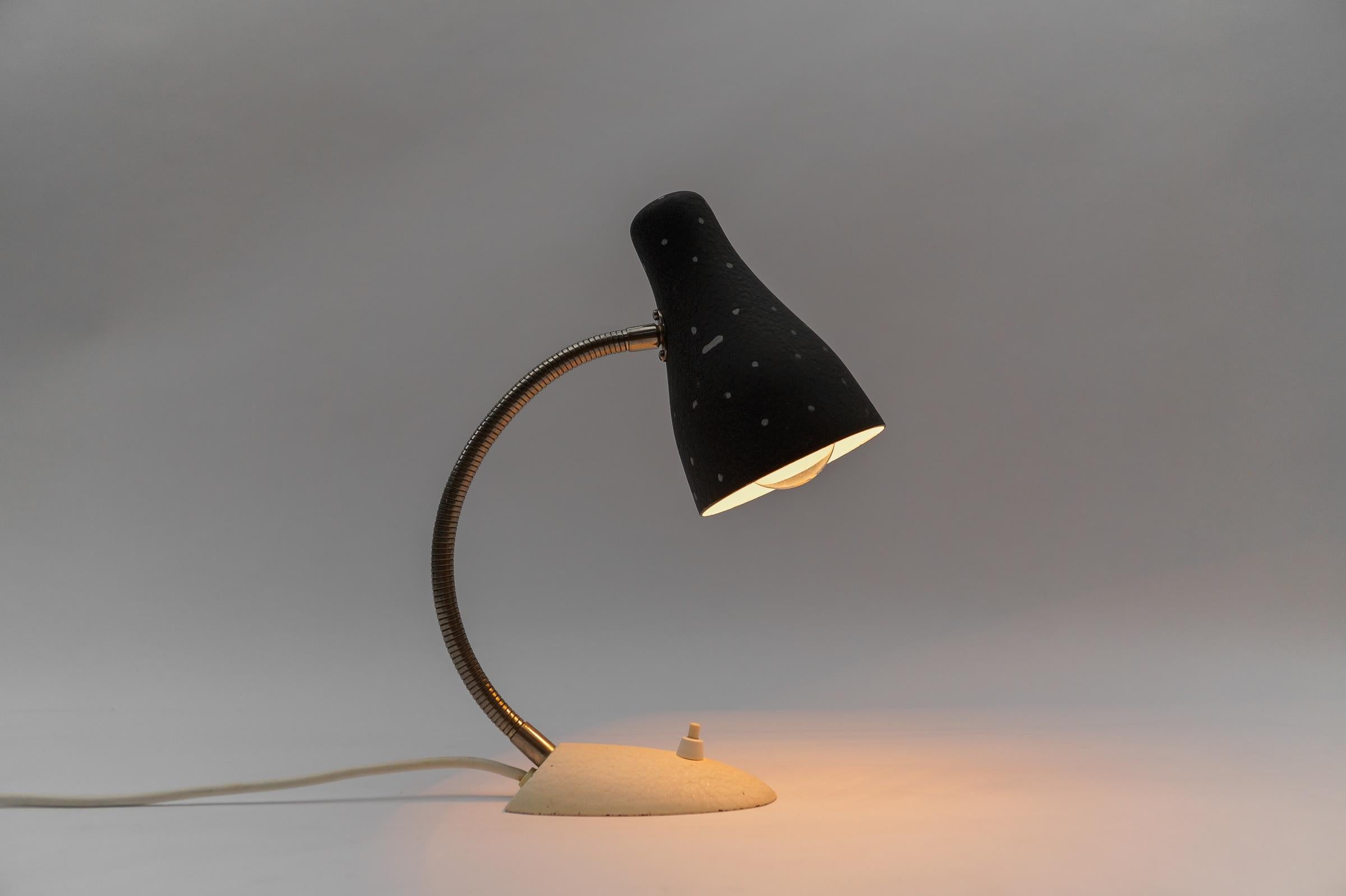 Petite Mid-Century Modern Table Lamp in Brass and Opaline Glass, 1950s

The lamp needs 1 x E14 / E15 Edison screw fit bulb, is wired, and in working condition. It runs both on 110 / 230 volt.

Very elegant and cute at the same time.

Light bulbs are