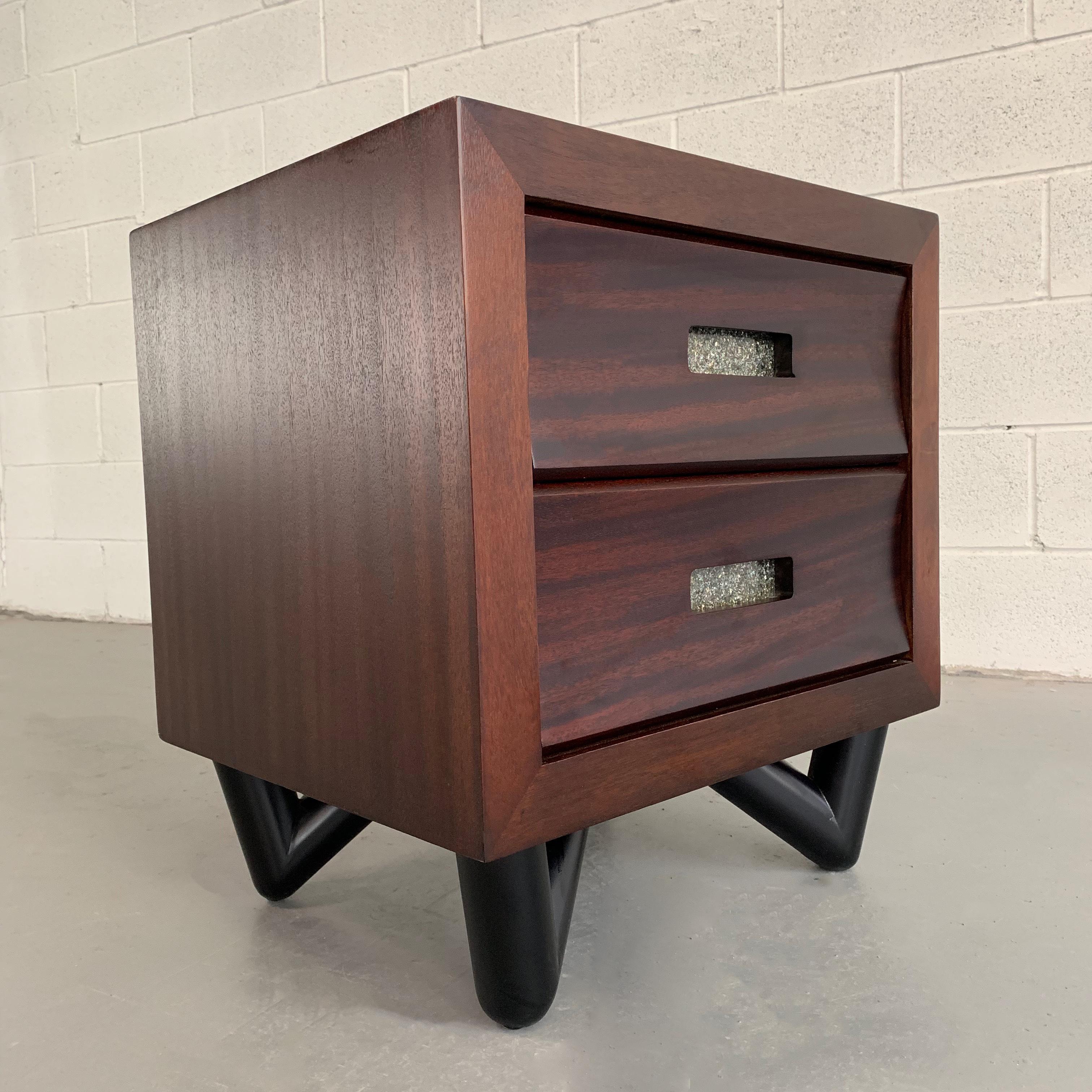 Single, petite, Mid-Century Modern dresser or nightstand or end table features a walnut cabinet with sculpted, lacquered maple base and mother of pearl inserts on the handles. The 2 interior heights of the drawers is 5.5 inch on the bottom and 5