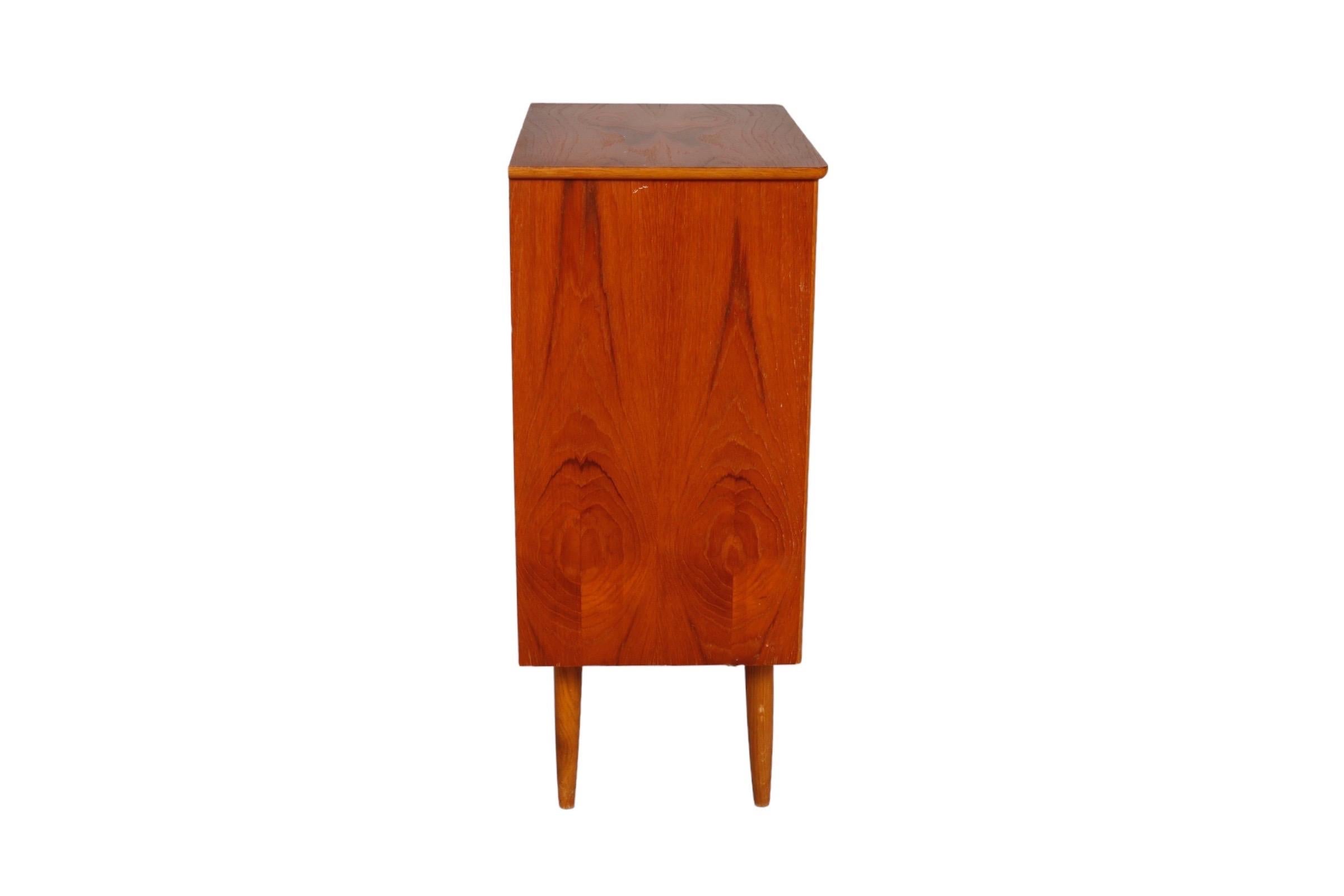 Mid-20th Century Petite Mid-Century Teak Five Drawer Dresser