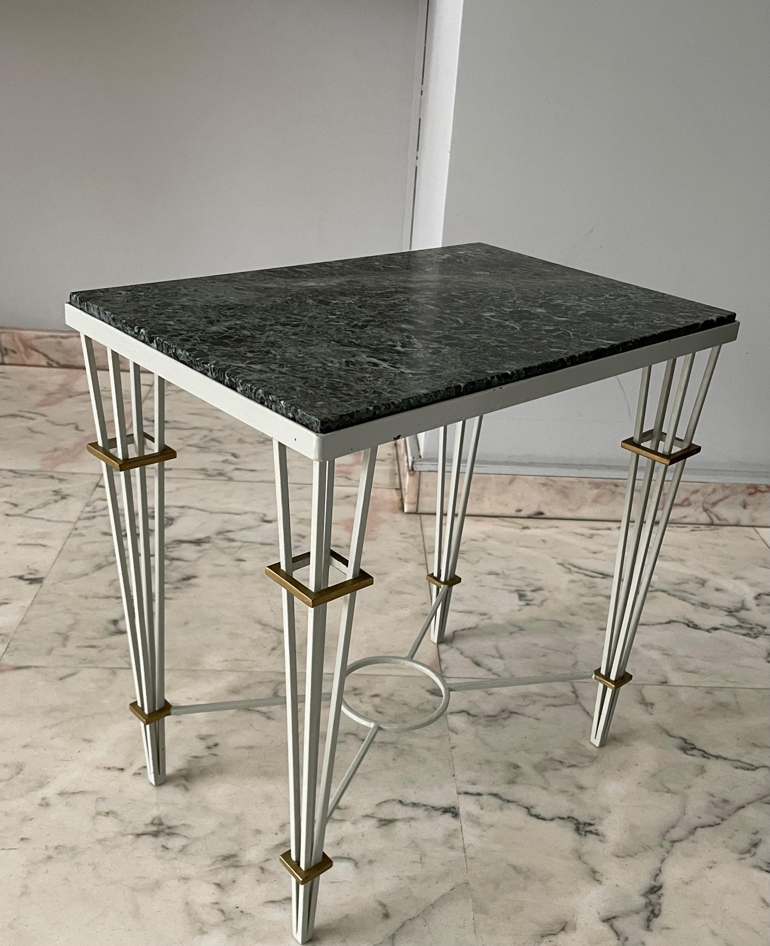 Small white lacquer neoclassical side table with a green marble top.
By J.Adnet, France 1948.