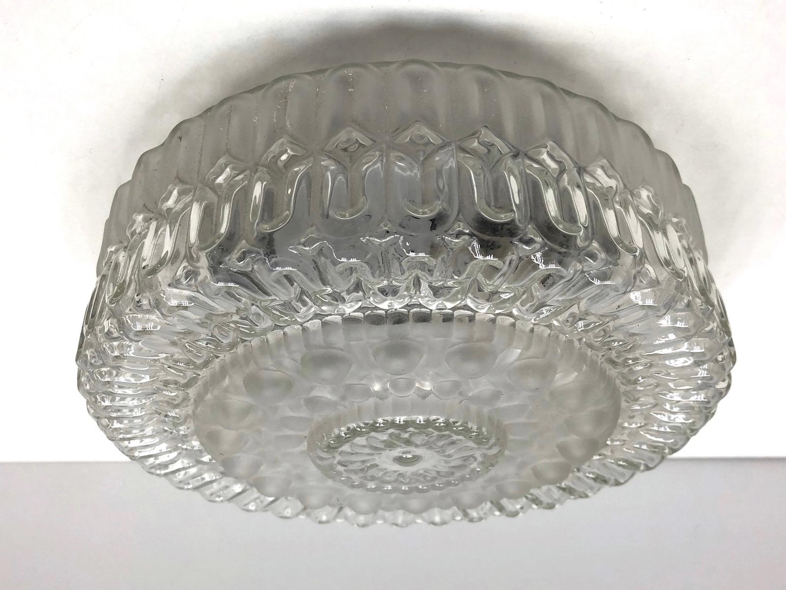 Petite organic bubble pattern flush mount. Gorgeous textured glass flush mount with metal fixture. The fixture requires one European E27 Edison or Medium bulb up to 60 watts. Found on an estate sale in Austria.