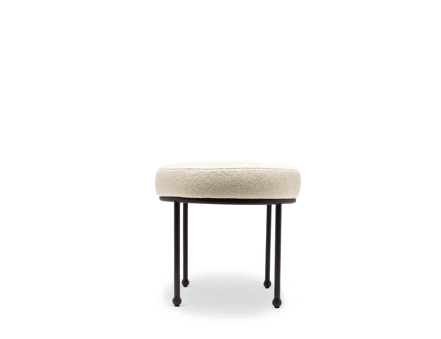The Petite Orsini Ottoman features a minimal metal base with decorative ball feet and an upholstered seat. 

The Lawson-Fenning Collection is designed and handmade in Los Angeles, California.