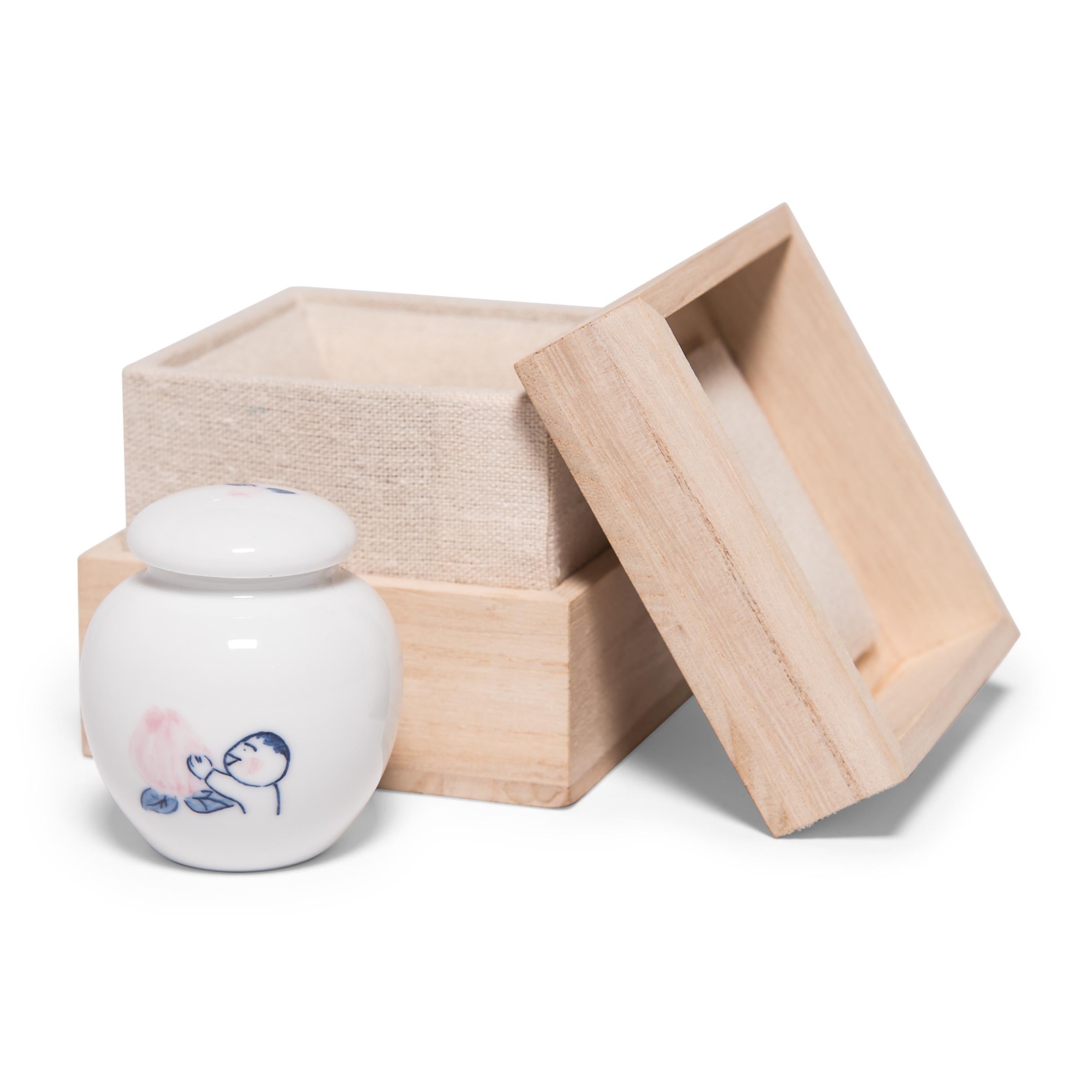 Created by Beijing-based artist Deng Ying exclusively for PAGODA RED, this limited edition hand painted ginger jar is one of a series playfully drawing on the Chinese tradition of blue-and-white porcelain. Fired at the historic Chinese imperial