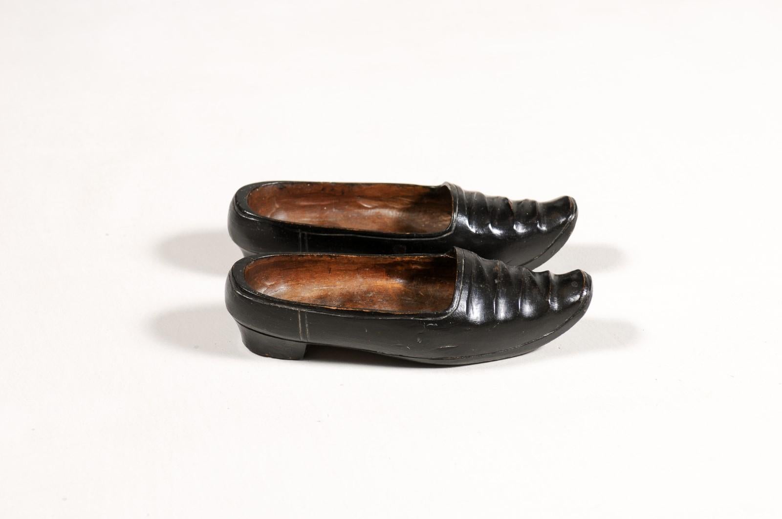 Petite Pair of Dutch 19th Century Ladies' Carved Wooden Clogs with Black Paint In Good Condition For Sale In Atlanta, GA