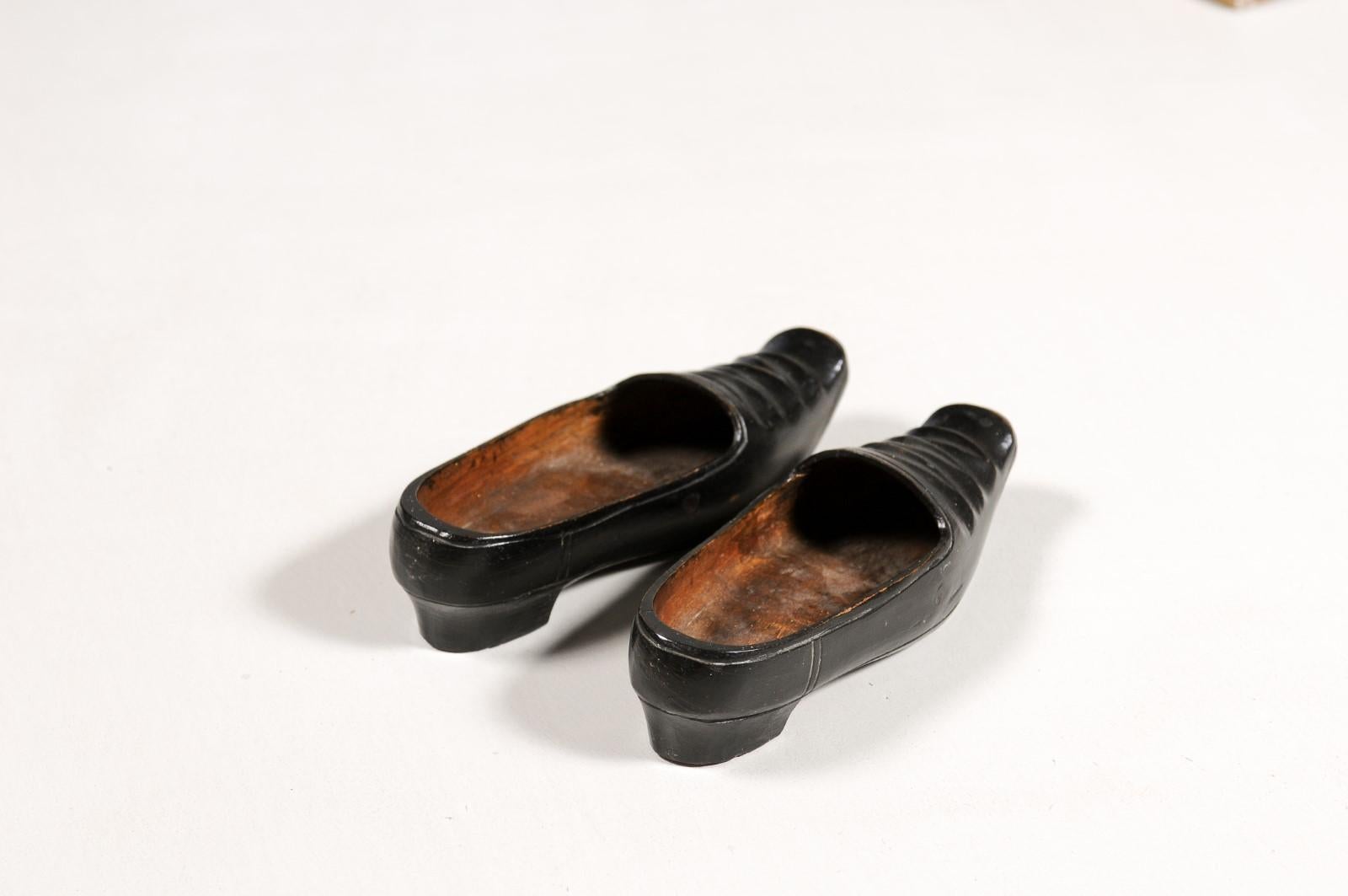 Petite Pair of Dutch 19th Century Ladies' Carved Wooden Clogs with Black Paint For Sale 1