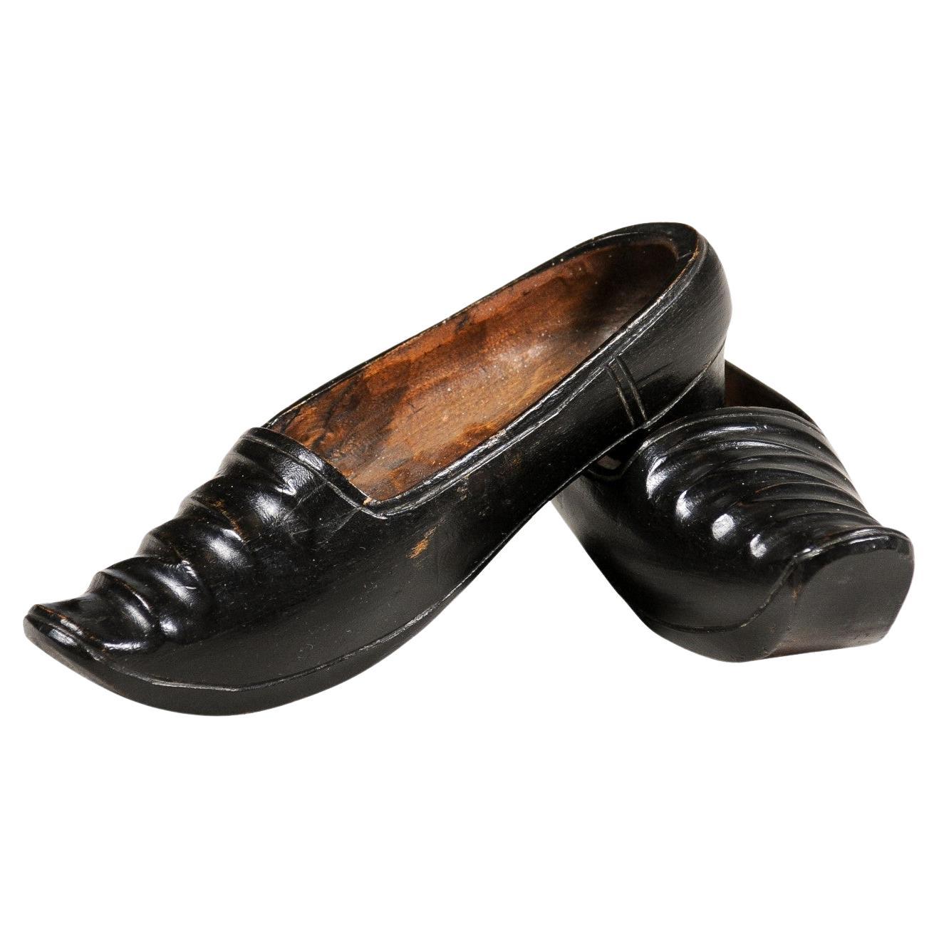 Petite Pair of Dutch 19th Century Ladies' Carved Wooden Clogs with Black Paint For Sale