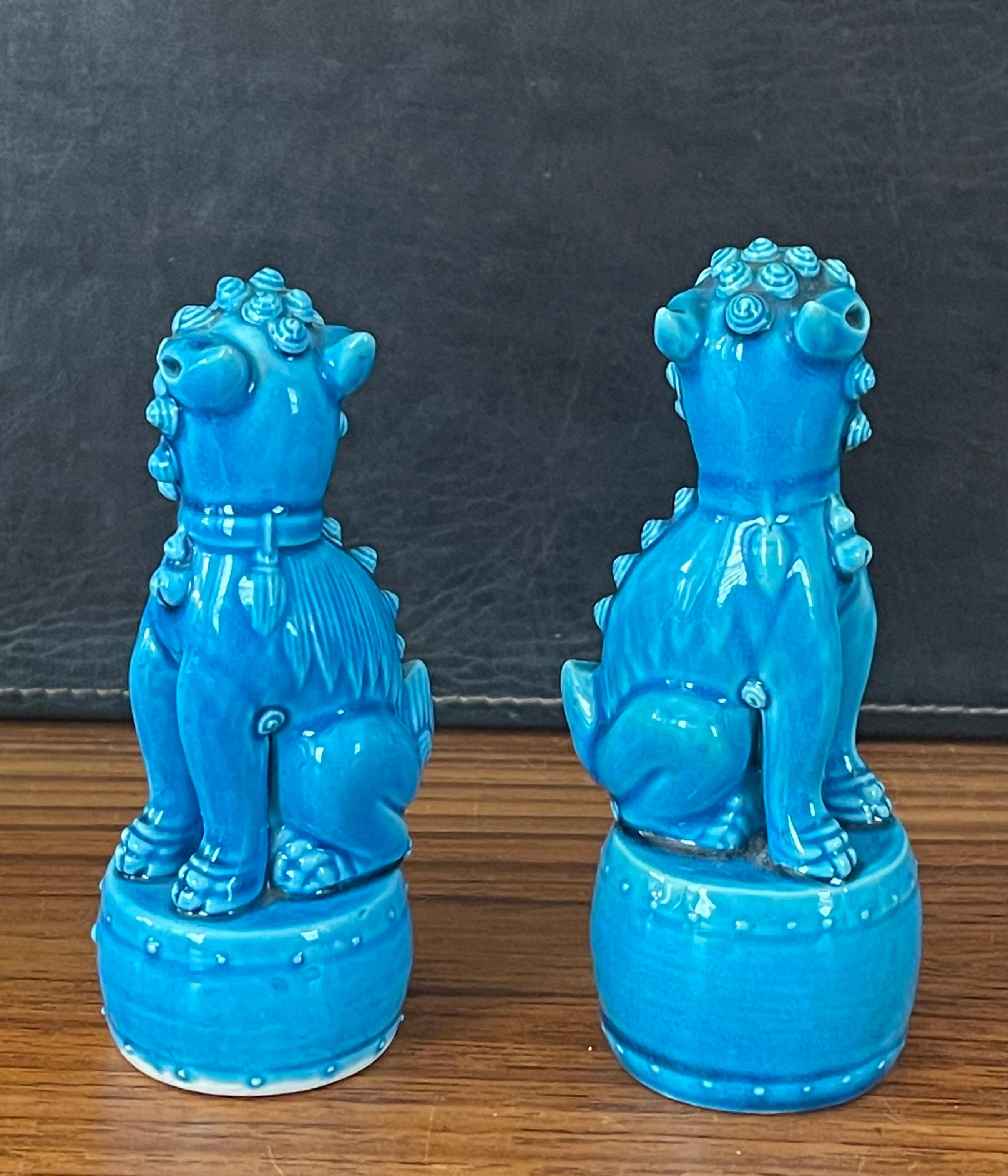 Chinese Petite Pair of Vintage Turquoise Blue Ceramic Foo Dog Sculptures For Sale