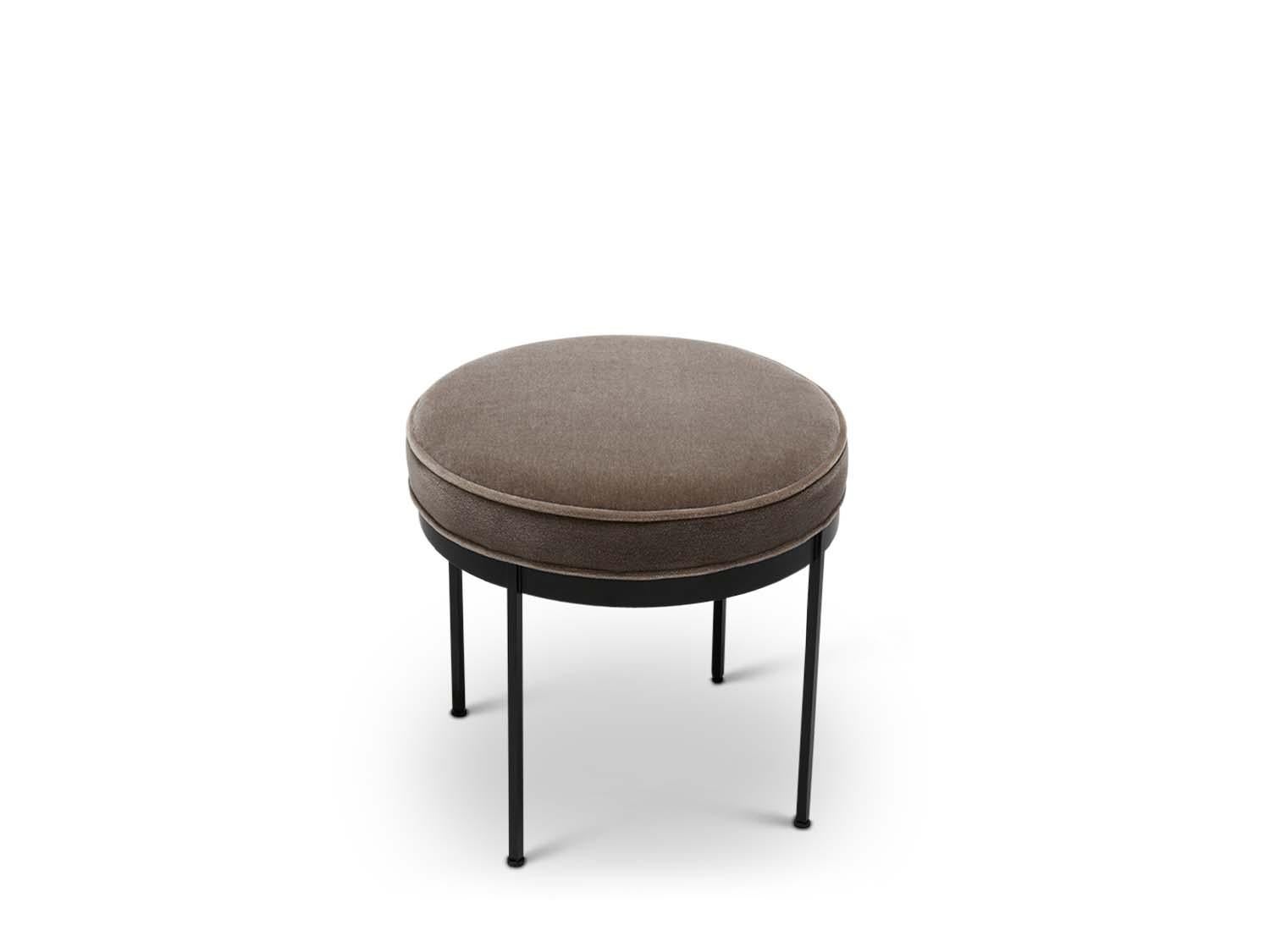 The Petite Paul ottoman features a round solid lacquered brass base and an upholstered seat with piping. Each leg features a rounded leveler. 

The Lawson-Fenning Collection is designed and handmade in Los Angeles, California. Reach out to