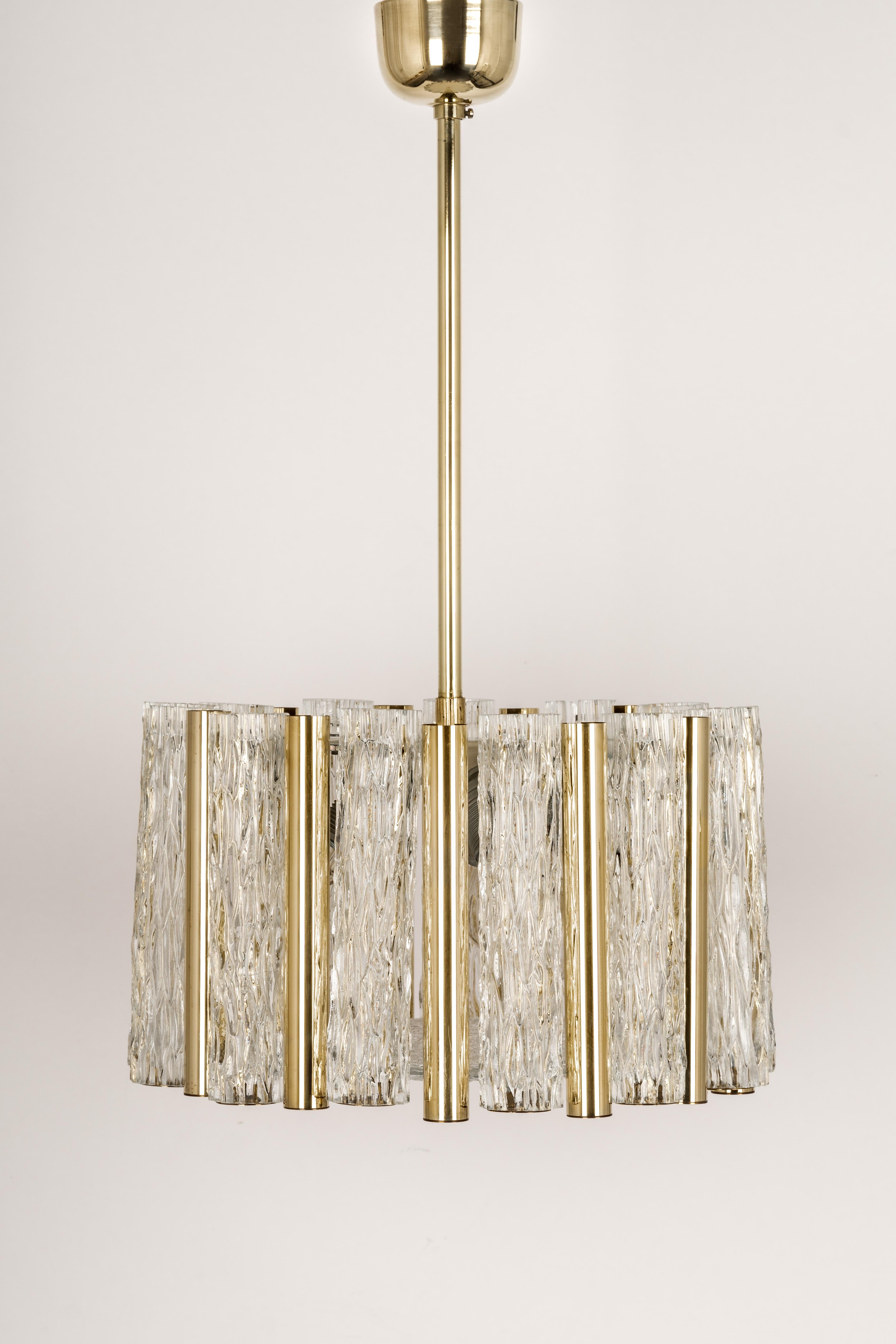 Brass drum form pendant ceiling fixture with tubular textured glass shades by Kaiser Leuchten, Germany, circa the 1960s.

High quality and in very good condition. Cleaned, well-wired and ready to use. 

The fixture requires 3 x E27 standard