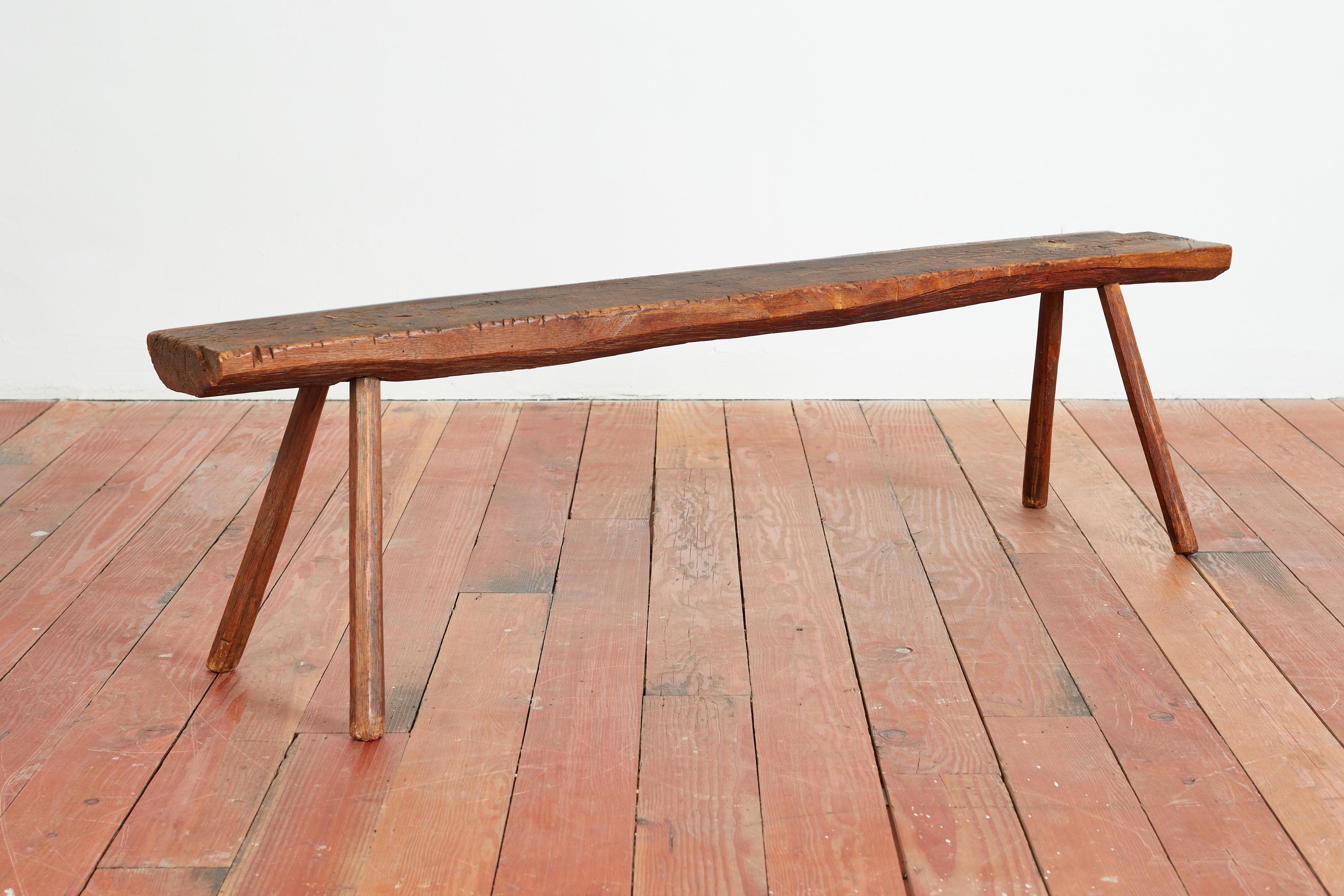 French primitive plank bench with wonderful patina. 
Simple and clean with joint detail. 