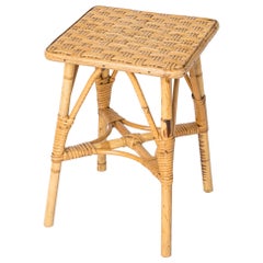 Pequeño taburete de ratán al estilo de Louis Sognot, Francia, años 60