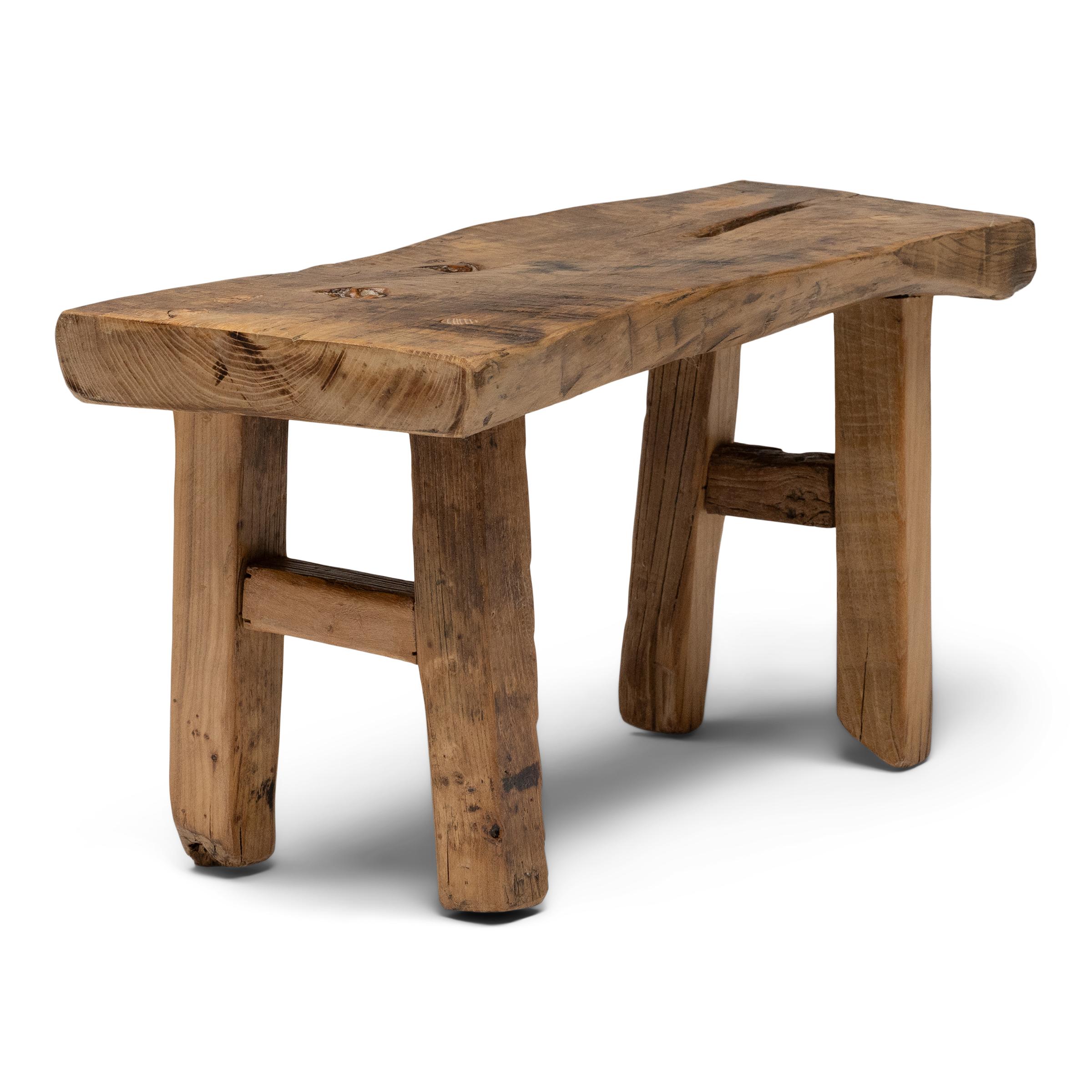 Made of wood reclaimed from 18th-century Chinese buildings, this petite bench brings the farmhouse modern aesthetic to traditional forms. Constructed with classic joinery techniques, the bench embraces the notion of “wabi-sabi