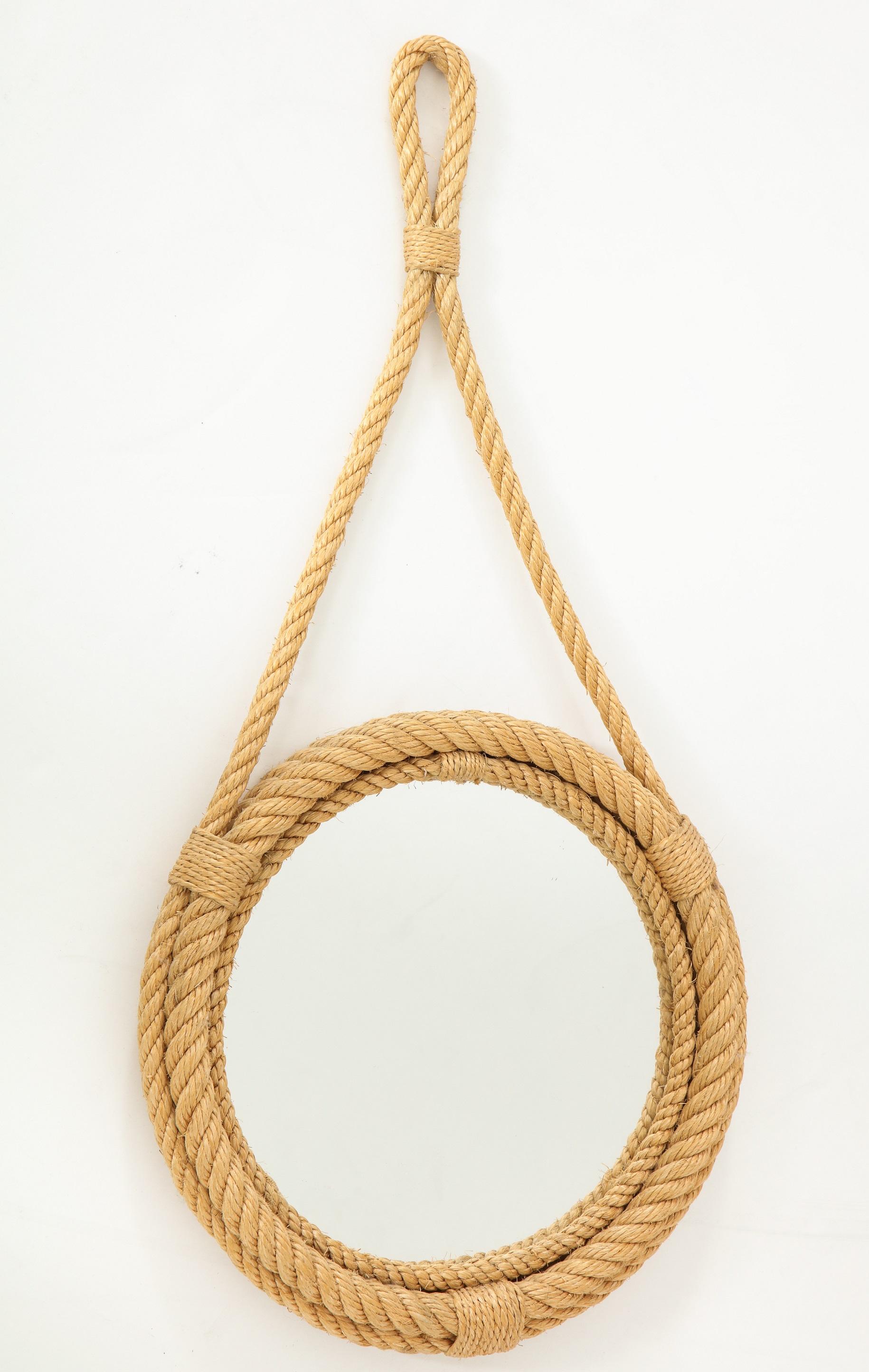 round mirror with rope hanger