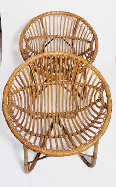 Pair of Petite Round Form Rattan Chairs