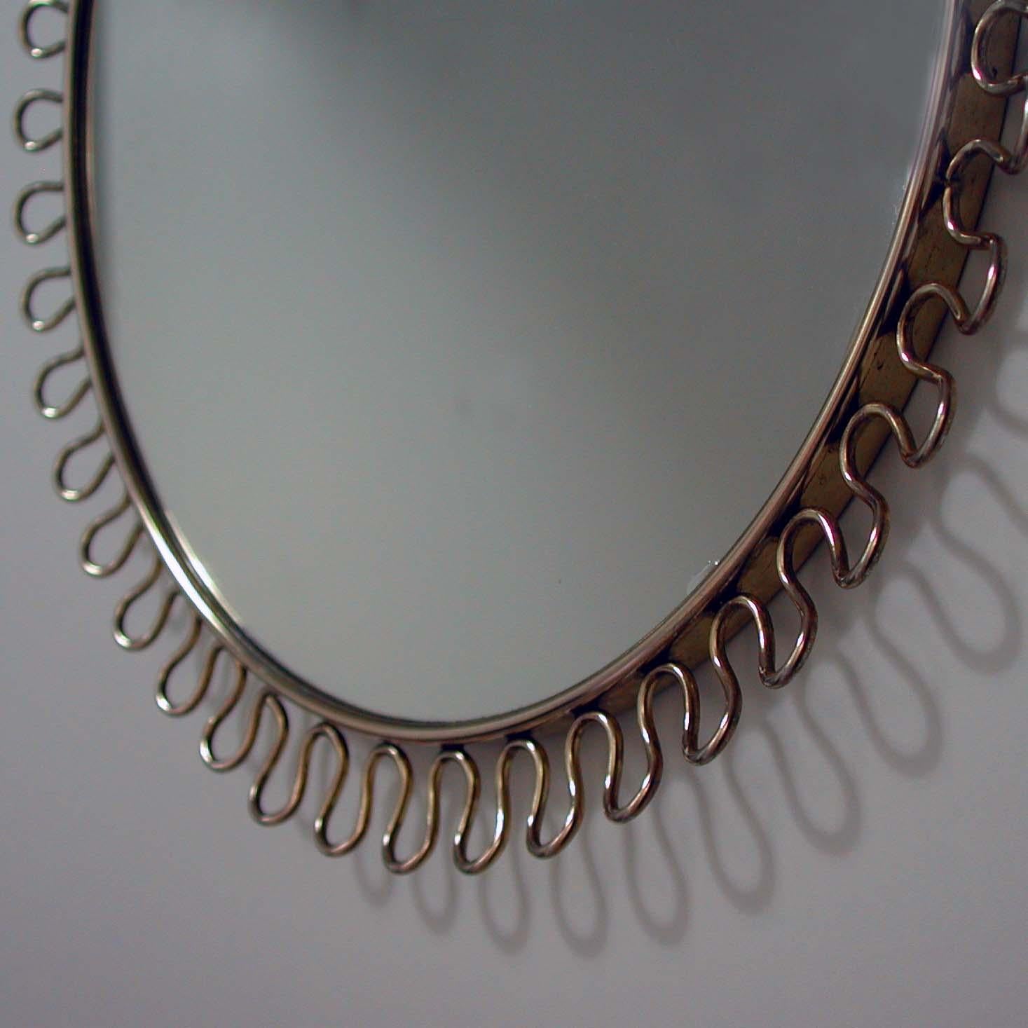 Mid-20th Century Petite Sculptural Brass Loop Mirror Attr. to Josef Frank for Svenskt Tenn, 1950s